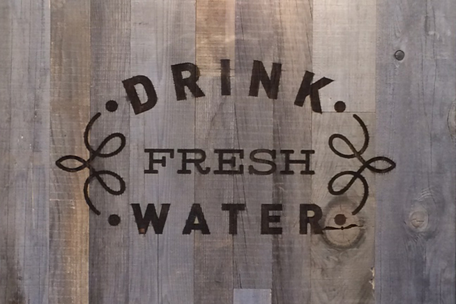 laser-engraved-gray-wood-wall.jpg