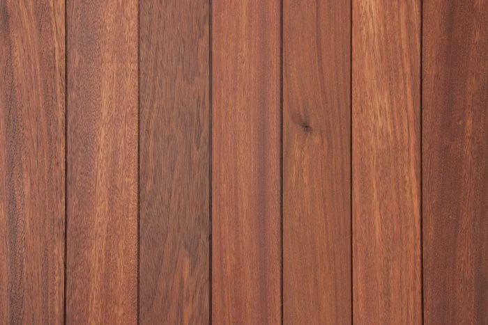 Reclaimed tropical Dinizia siding with clear oil