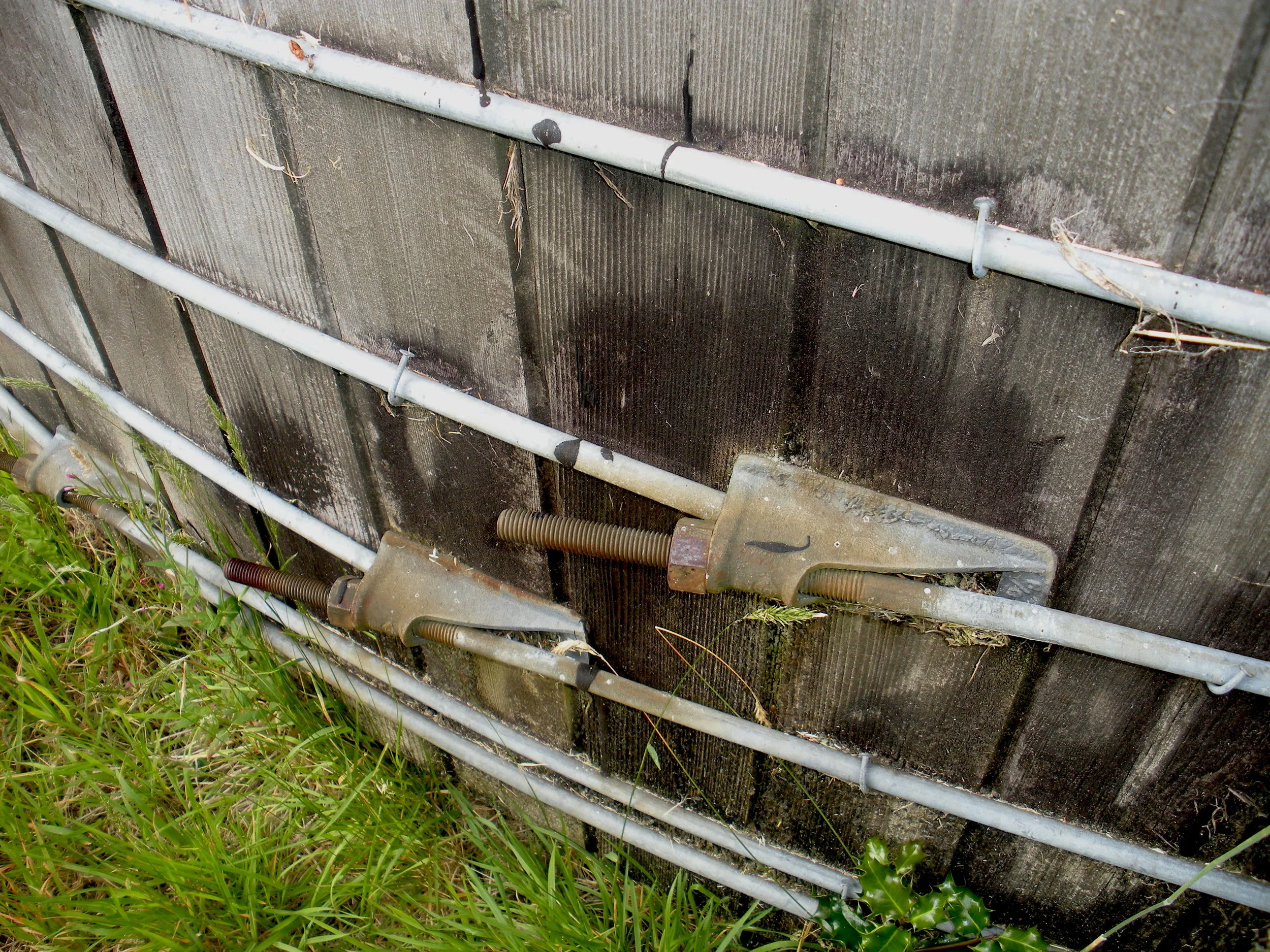 Redwood water tank dismantled to be resurfaced and finished as reclaimed wood wall cladding