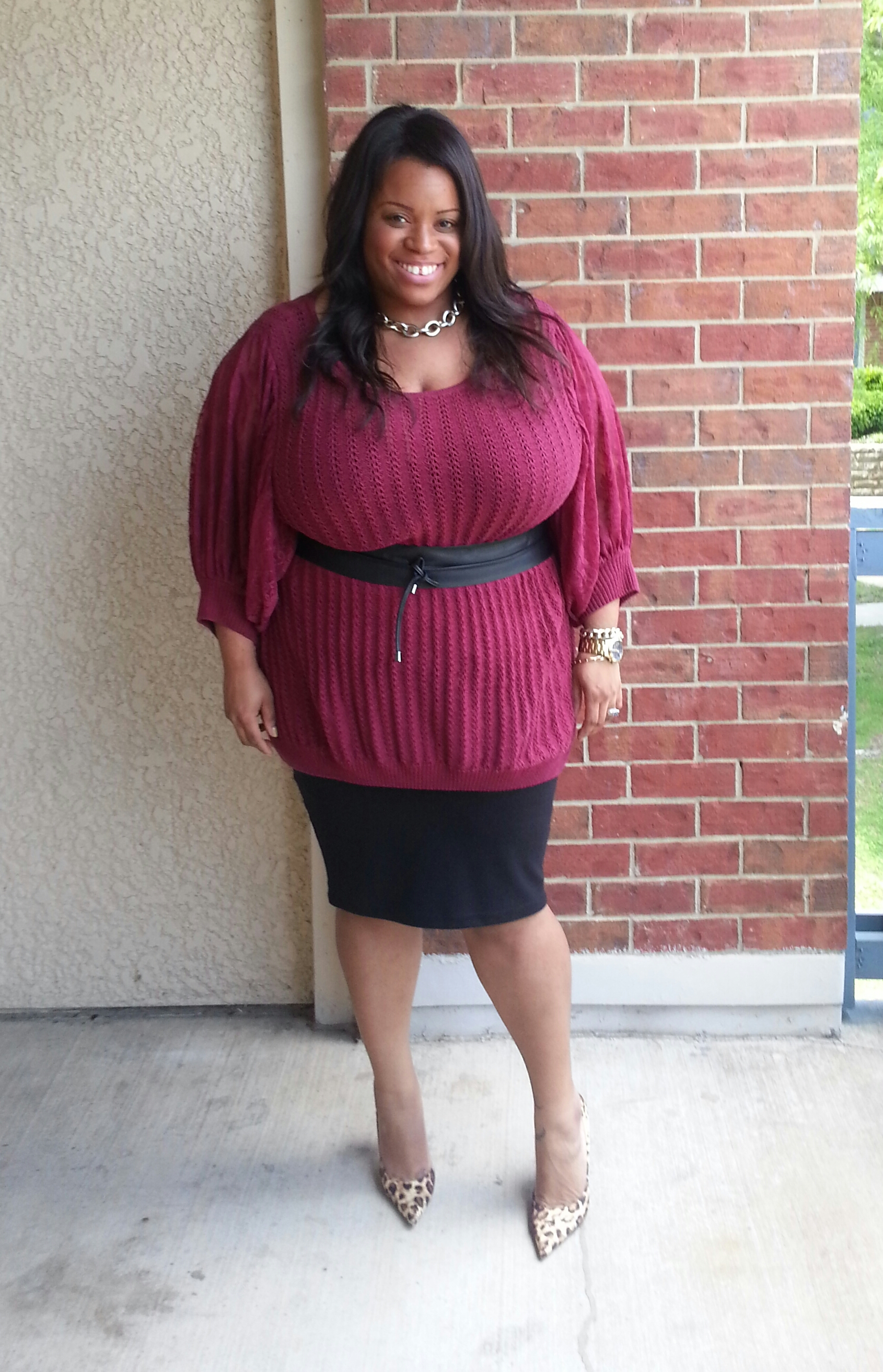 'Oxblood/ sweater and pencil skirt with a killer heel of course!