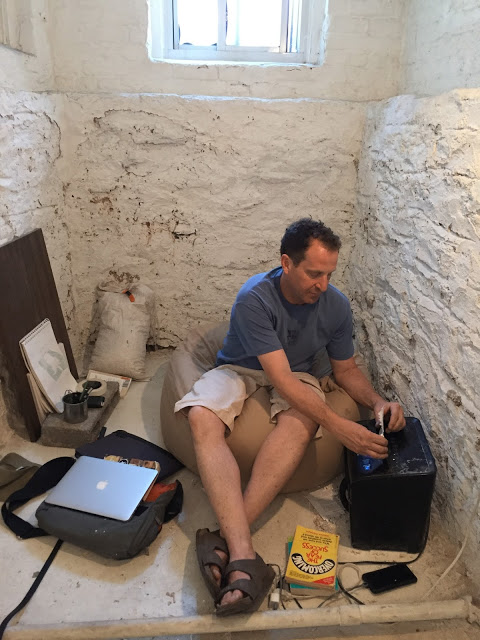 creating Self-Made Stone by reading and then shredding self-help books found on the streets of New York