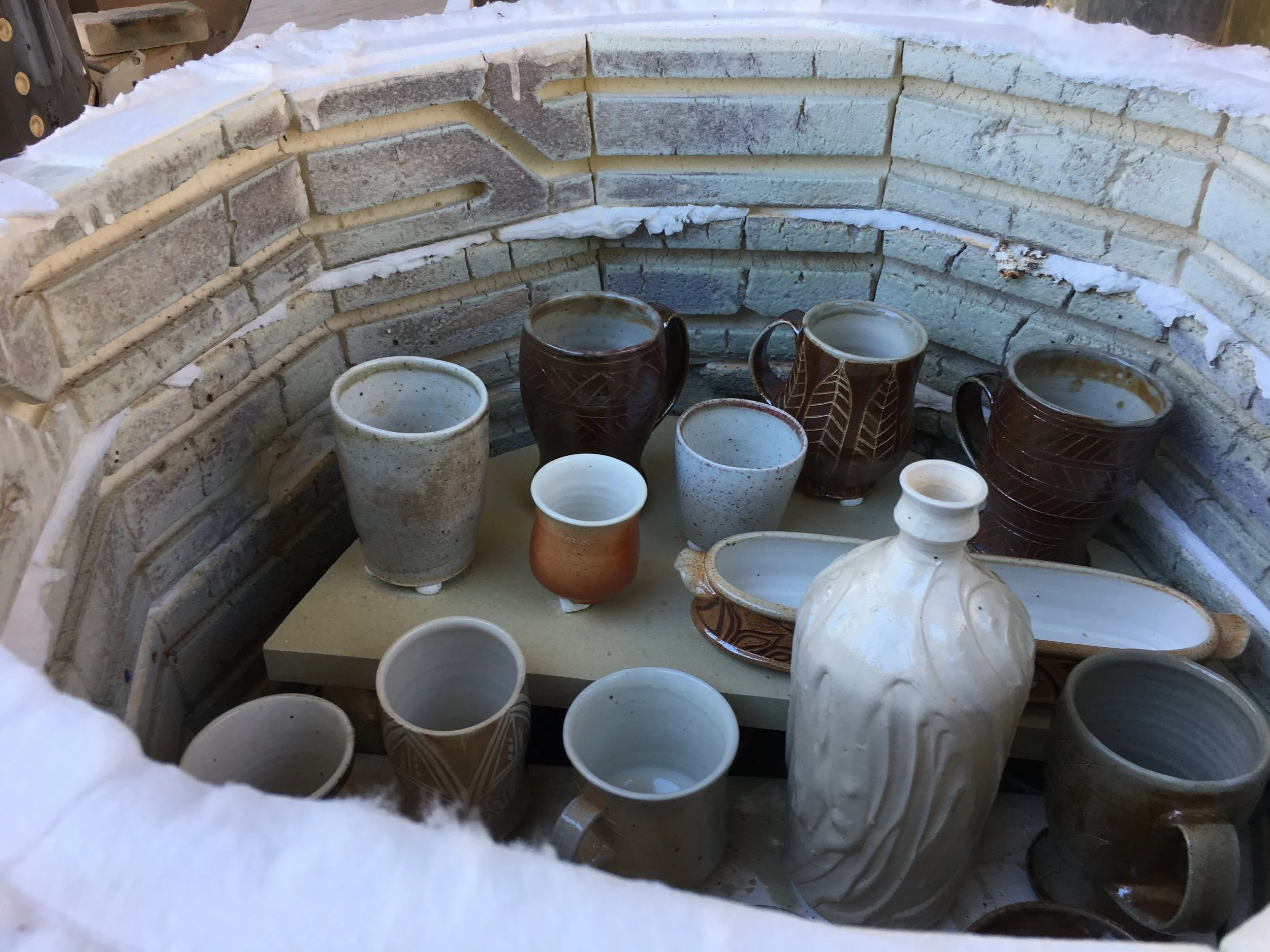 Kiln Chistmasukkah was well received! It looked remarkably similar to the results of what you'd get from a more traditional soda firing, with just a little less reduction. 