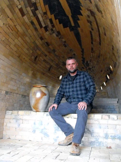 Meet Chad Brown! He's a 5th generation, Seagrove Potter. Chad is seated in his newly constructed 30' long wood kiln. Like I said, he needs a post of his own, but for now, you can learn more about Chad, his pots, and wood kiln on his website, here !