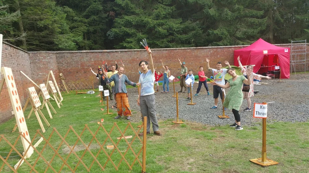 Knife throwing punters.jpg