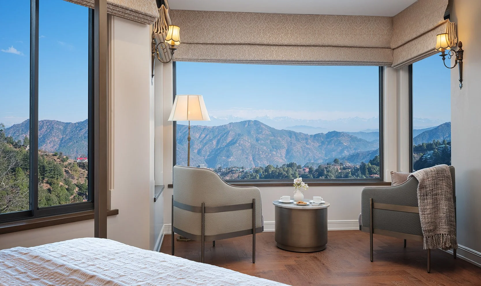 This a room view showcasing beautiful himalayan mountain ranges.