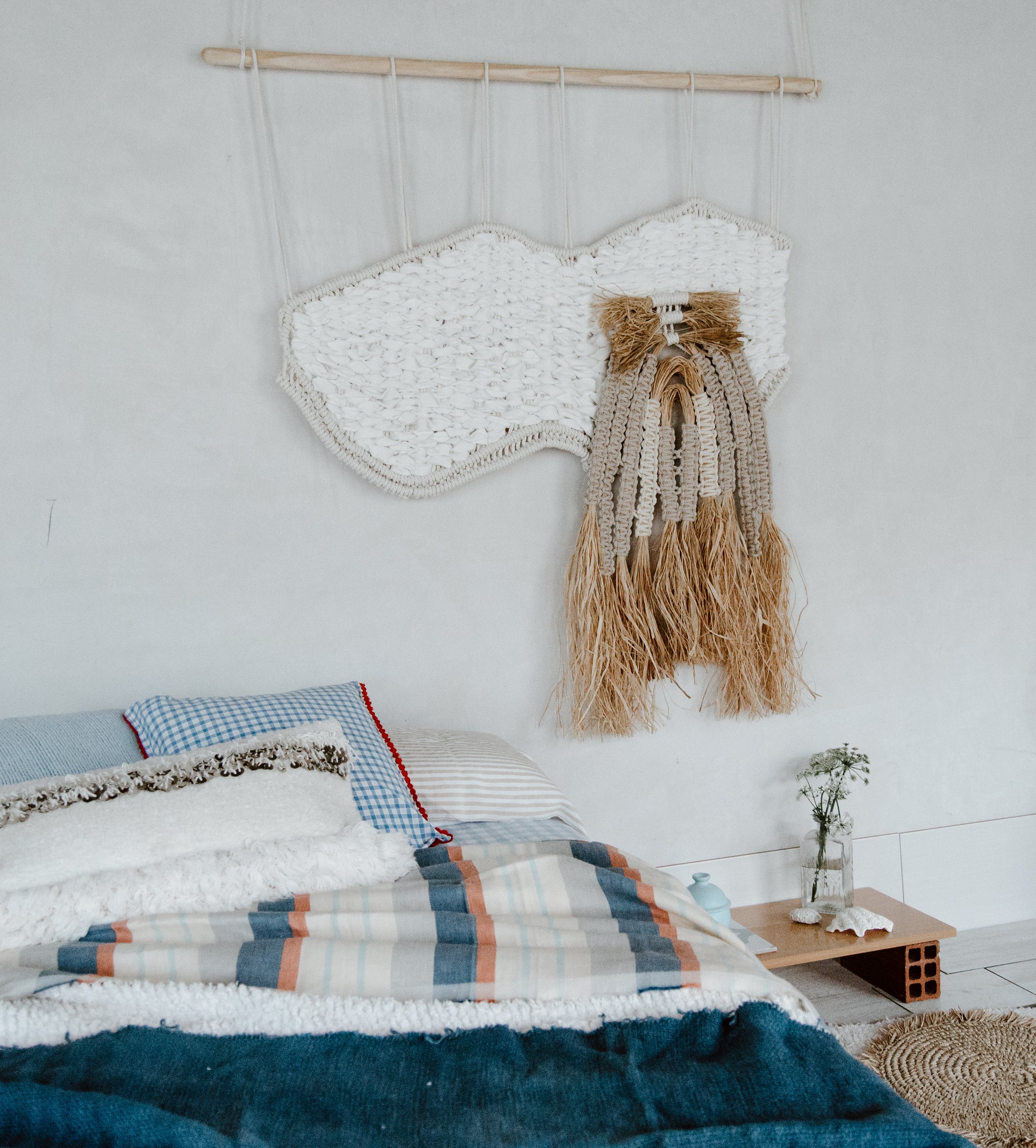 Macrame and weaving rainbow Fiber Art by textile artist Belen Senra