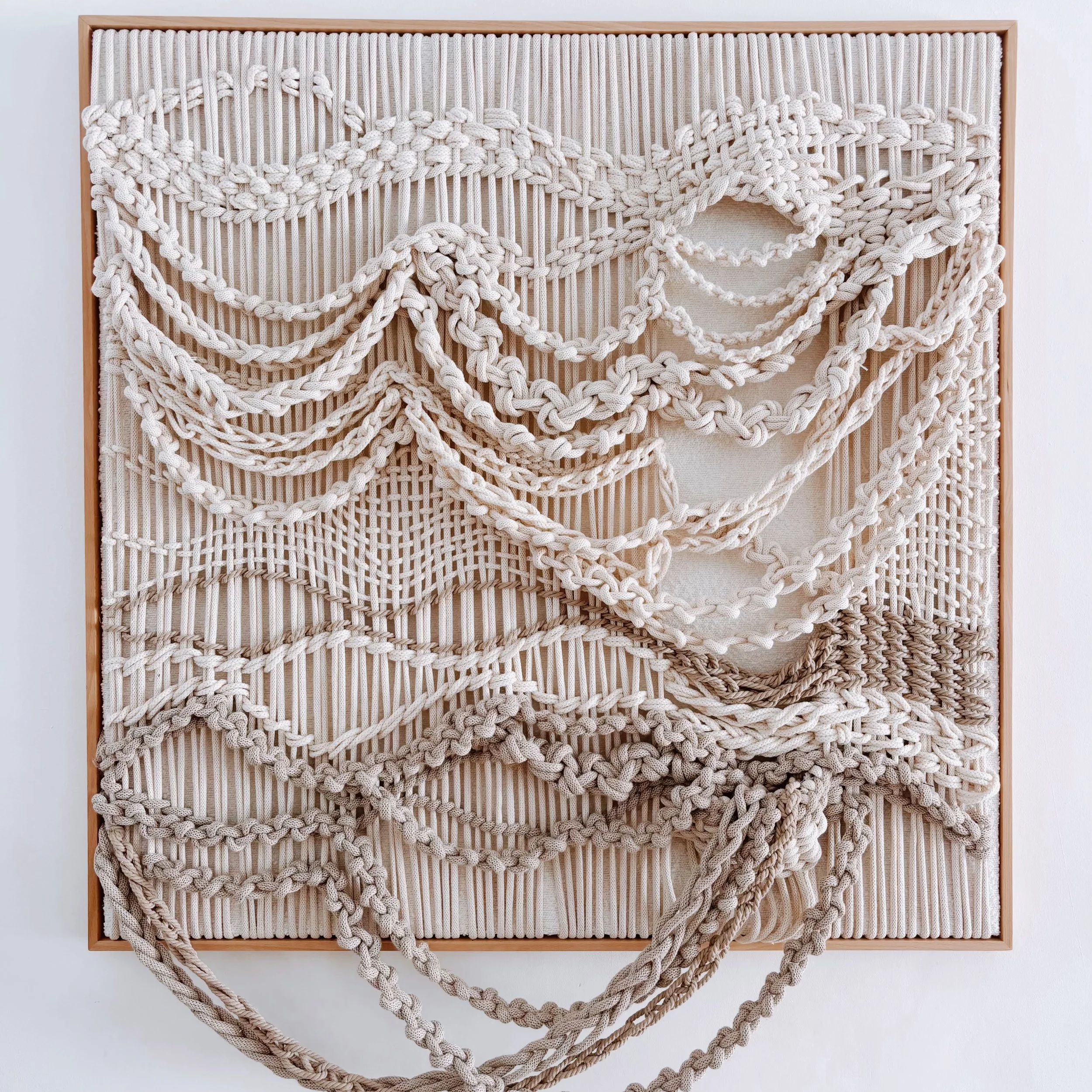 Discover Aleka, a handmade contemporary macramé wall artwork by Belén Senra. Made-to-order textile art crafted with natural cotton and linen for luxury interiors and contemporary art collectors