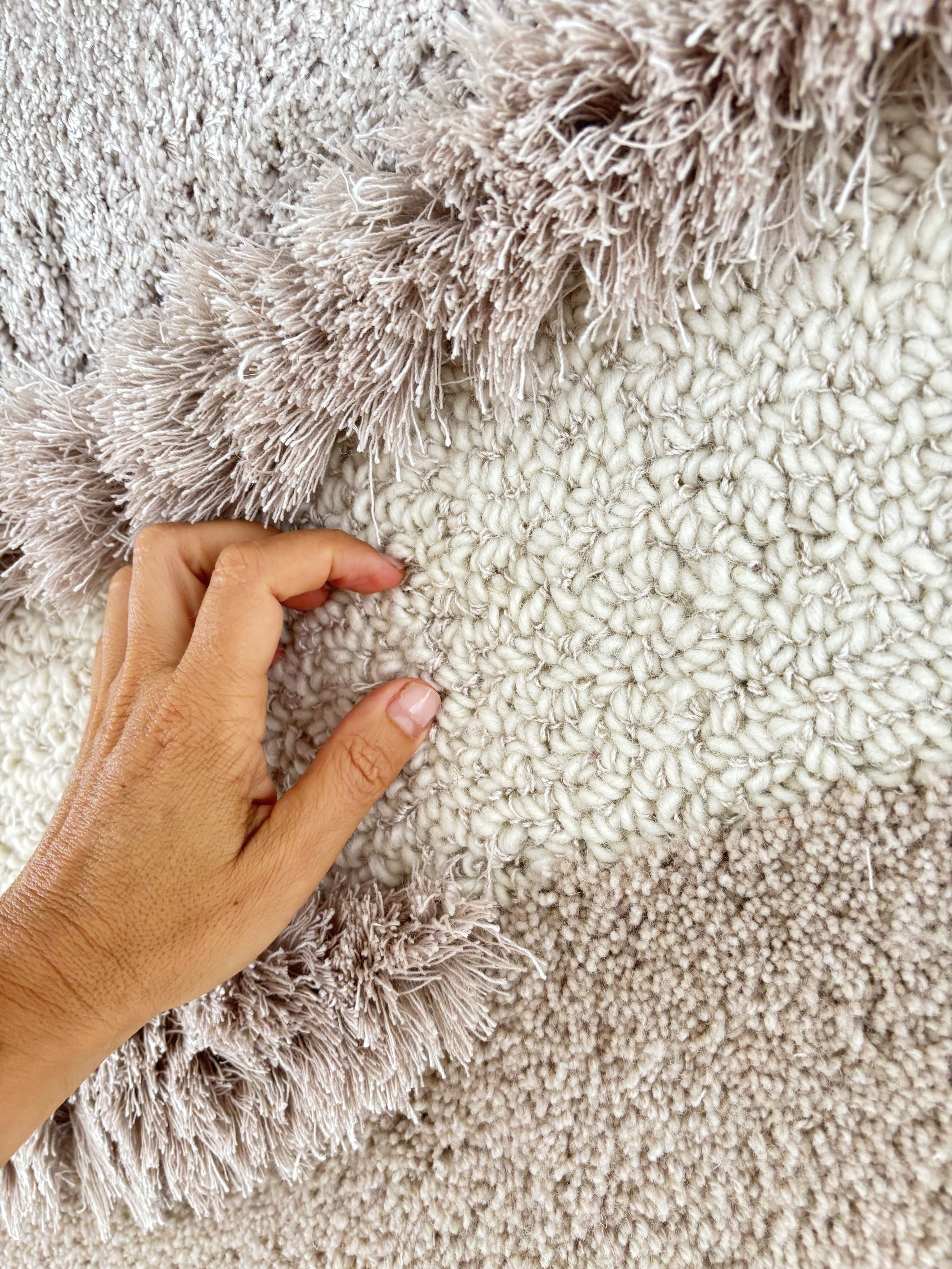 Artisan hand-tufted wall tapestry inspired by landscape contours, combining wool textures and organic modern design aesthetics. (Copy)