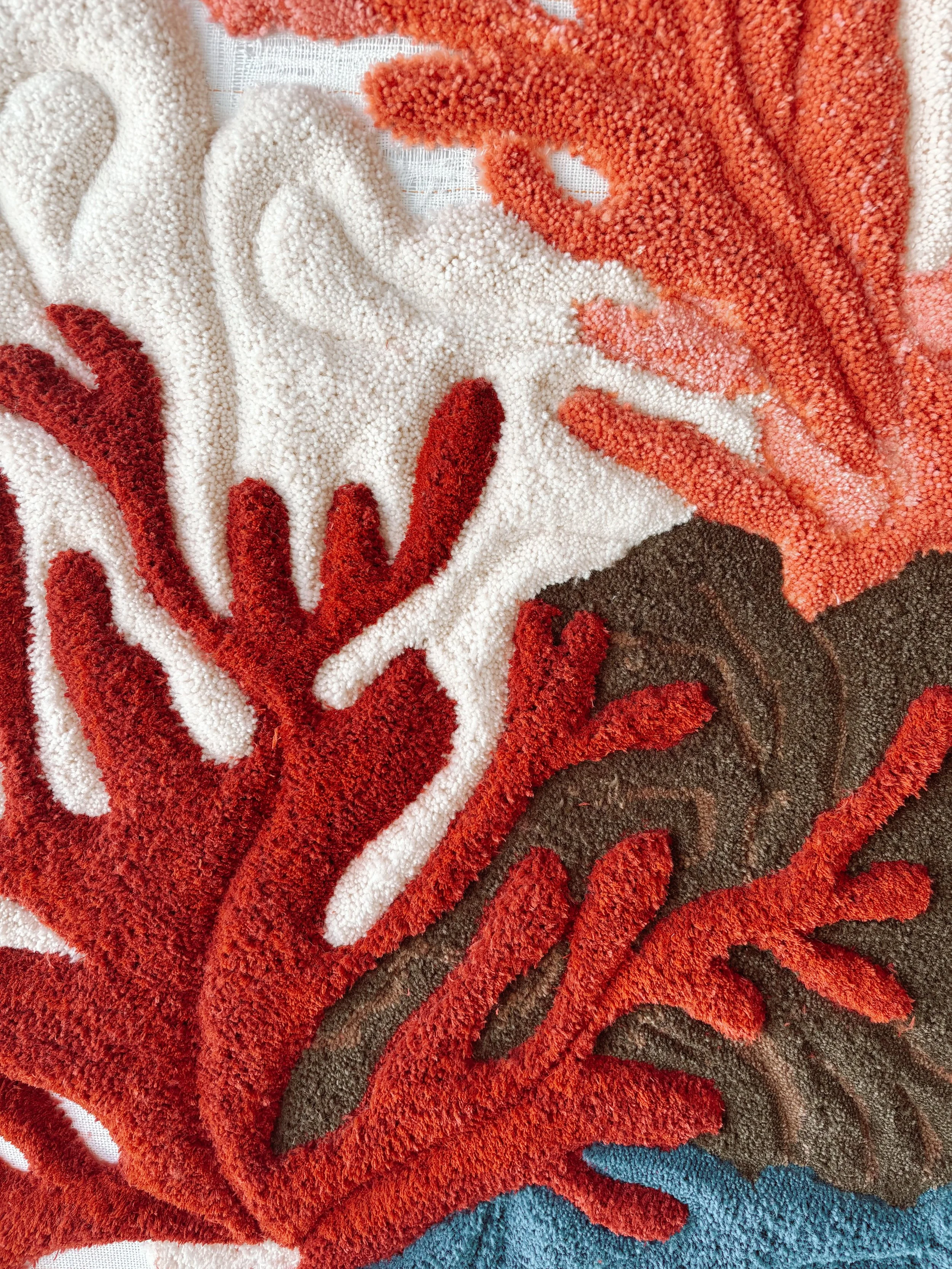 Living Reef is a handcrafted wool textile sculpture by Belén Senra.