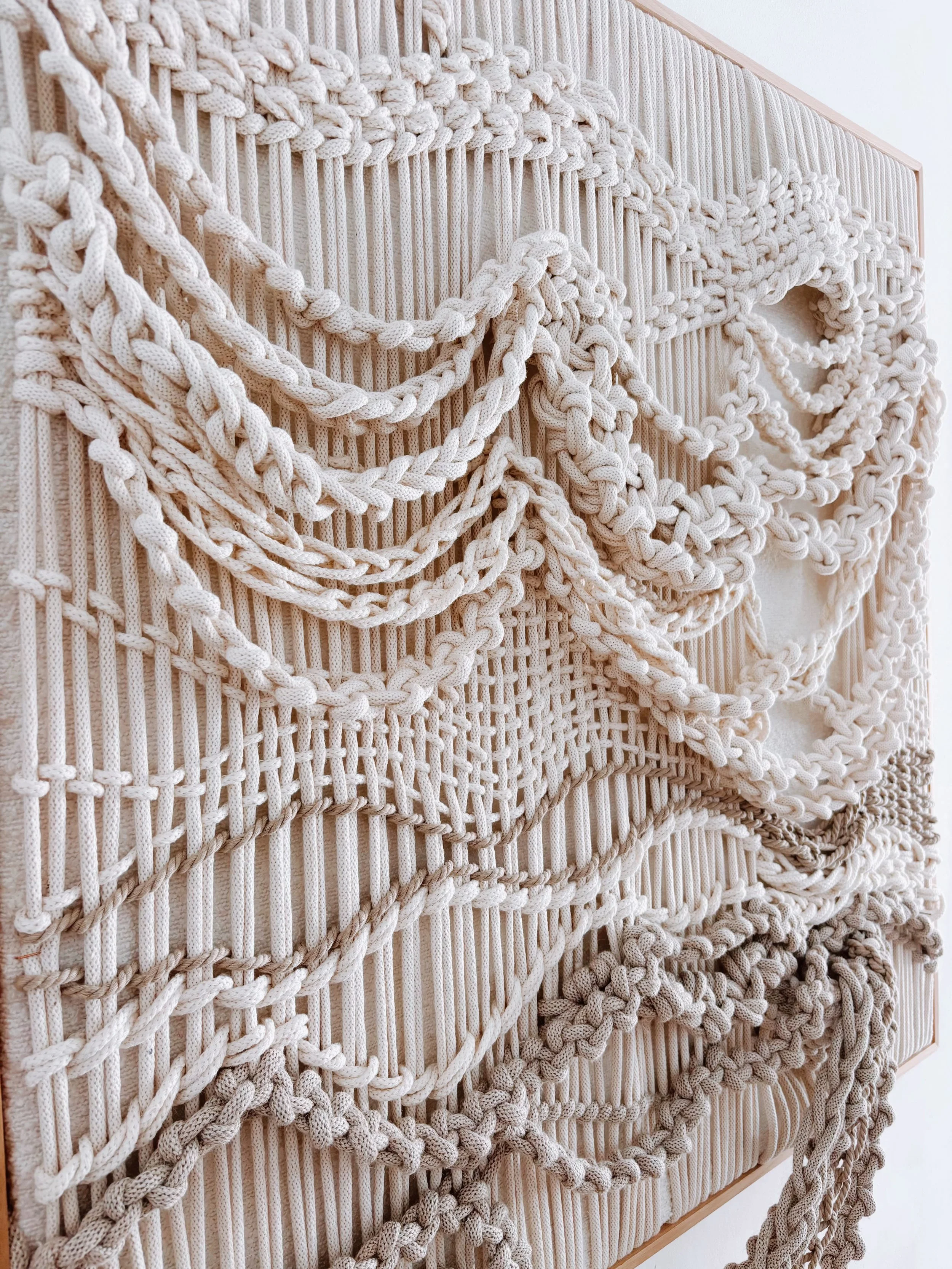 Discover Aleka, a handmade contemporary macramé wall artwork by Belén Senra. Made-to-order textile art crafted with natural cotton and linen for luxury interiors and contemporary art collectors