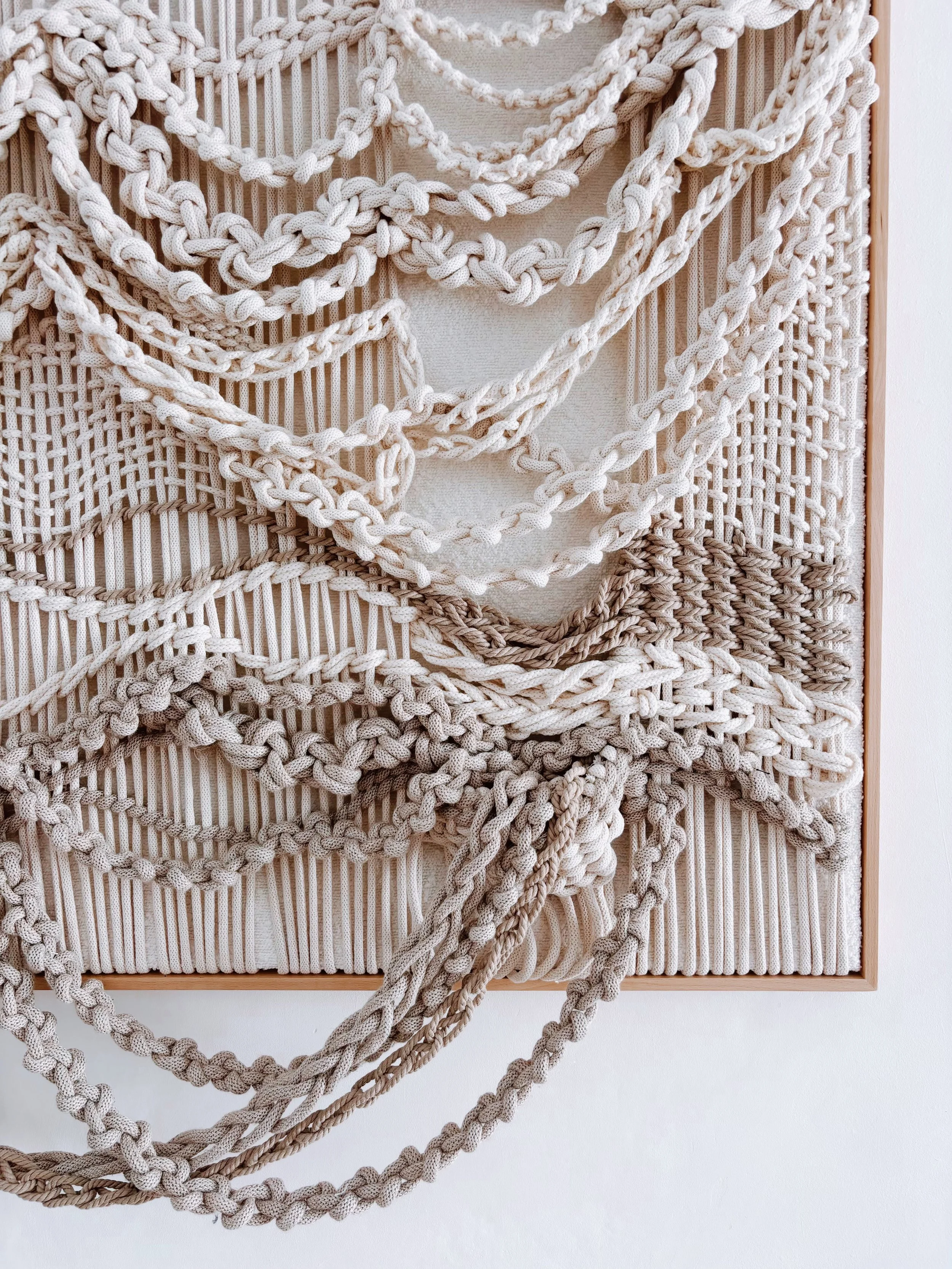 Discover Aleka, a handmade contemporary macramé wall artwork by Belén Senra. Made-to-order textile art crafted with natural cotton and linen for luxury interiors and contemporary art collectors