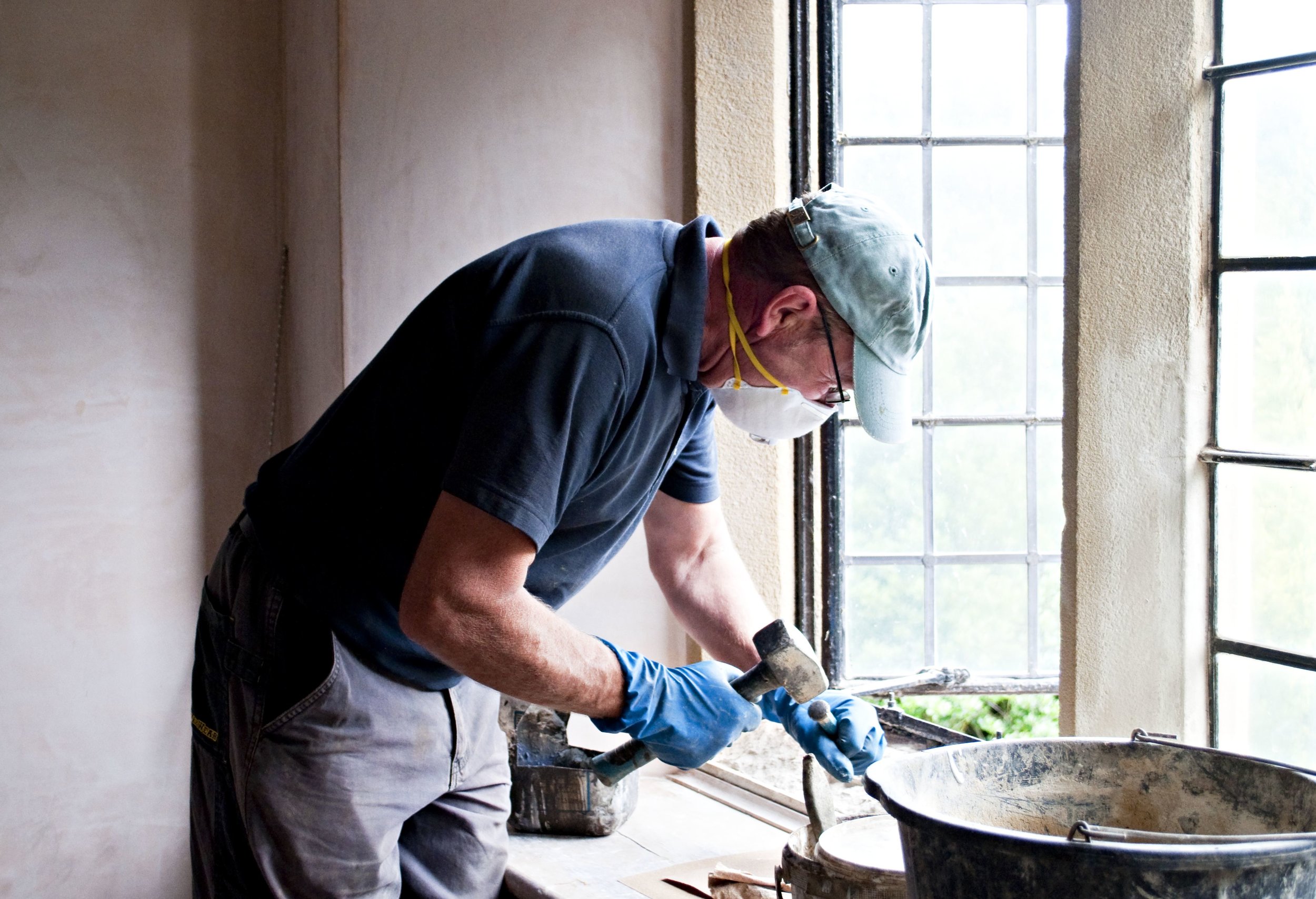 Paul hard at work, restoring some of our stonework.