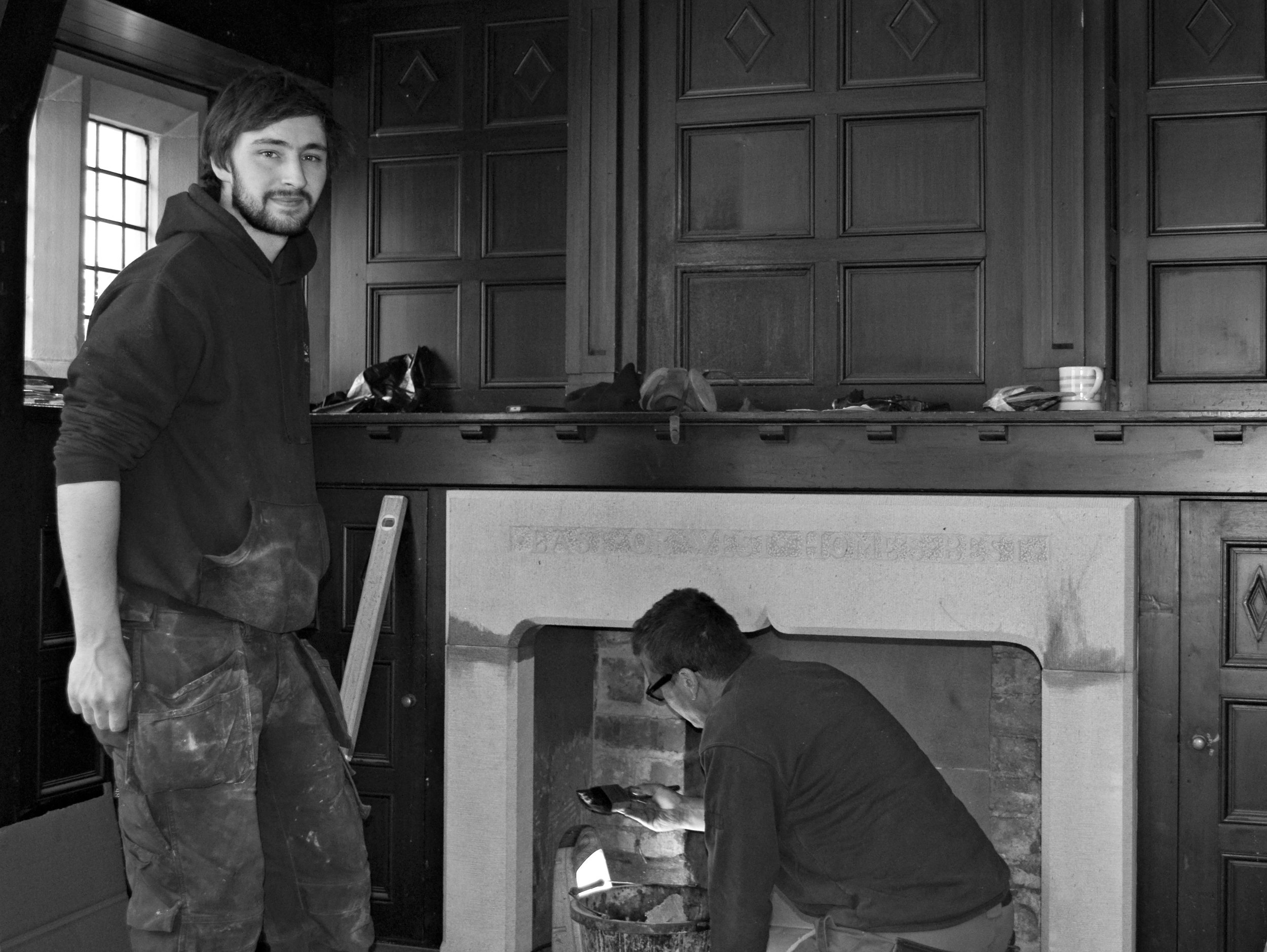 Lewis and Paul working on the installation