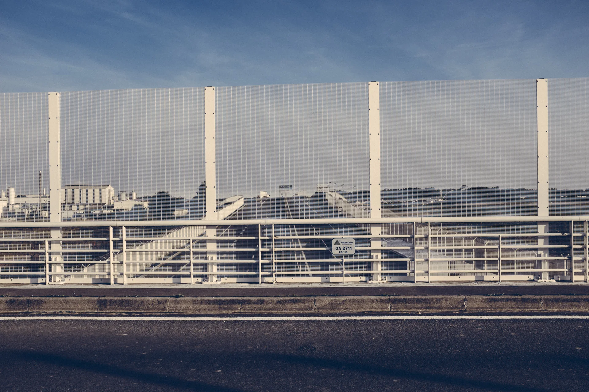 The highway adjacent to the Jungle, leading to the U.K. Calais, France. 2016.