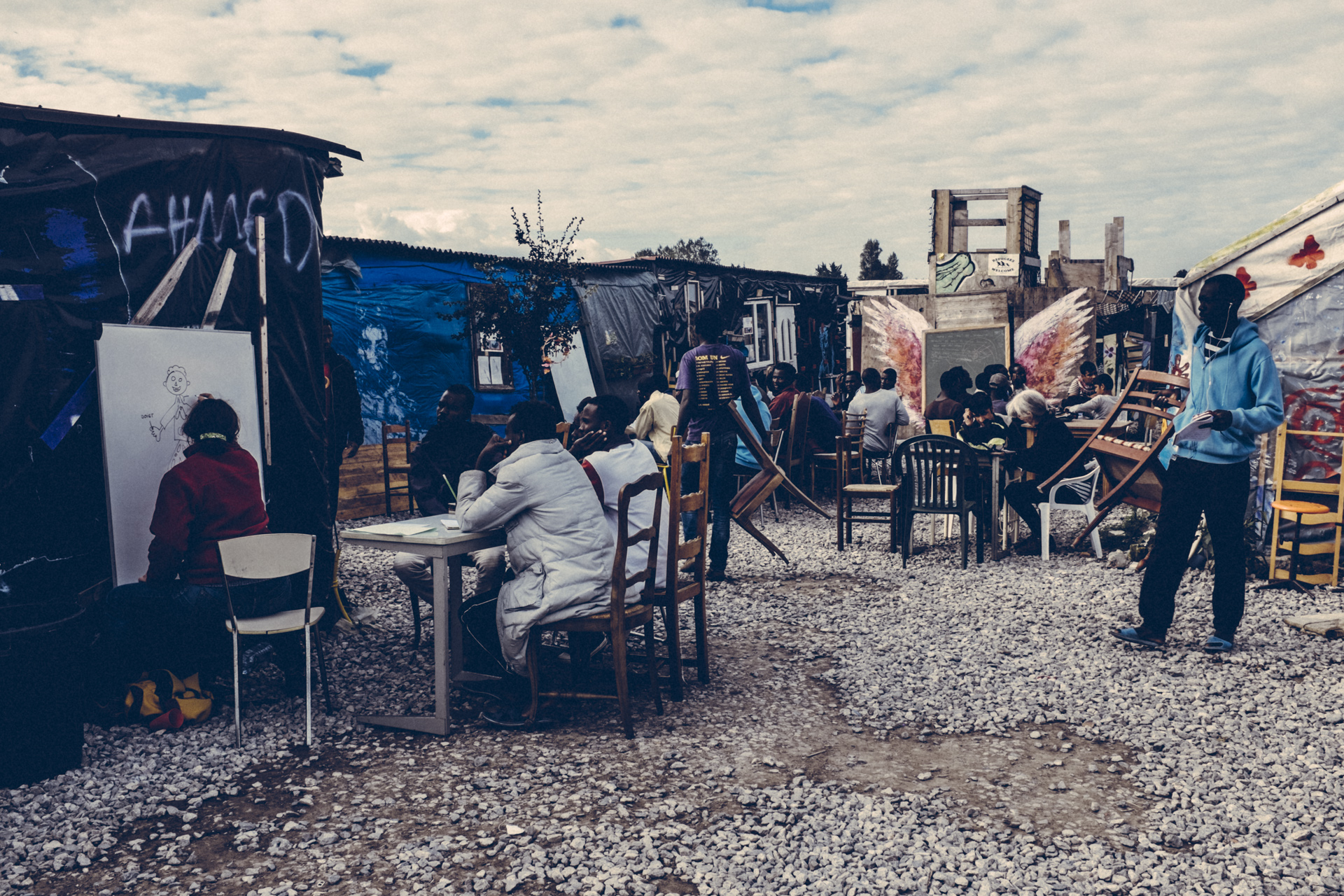  A class in-session at L'Ecole Laique du Chemin des Dunes in the Jungle. Calais, France. 2016. 