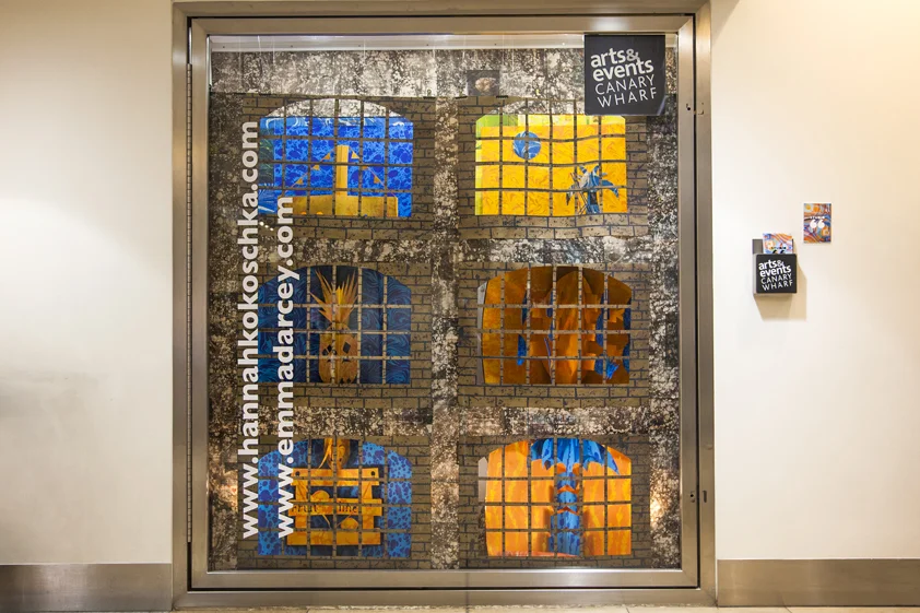 Canary Wharf giant pop-up, marbled window display