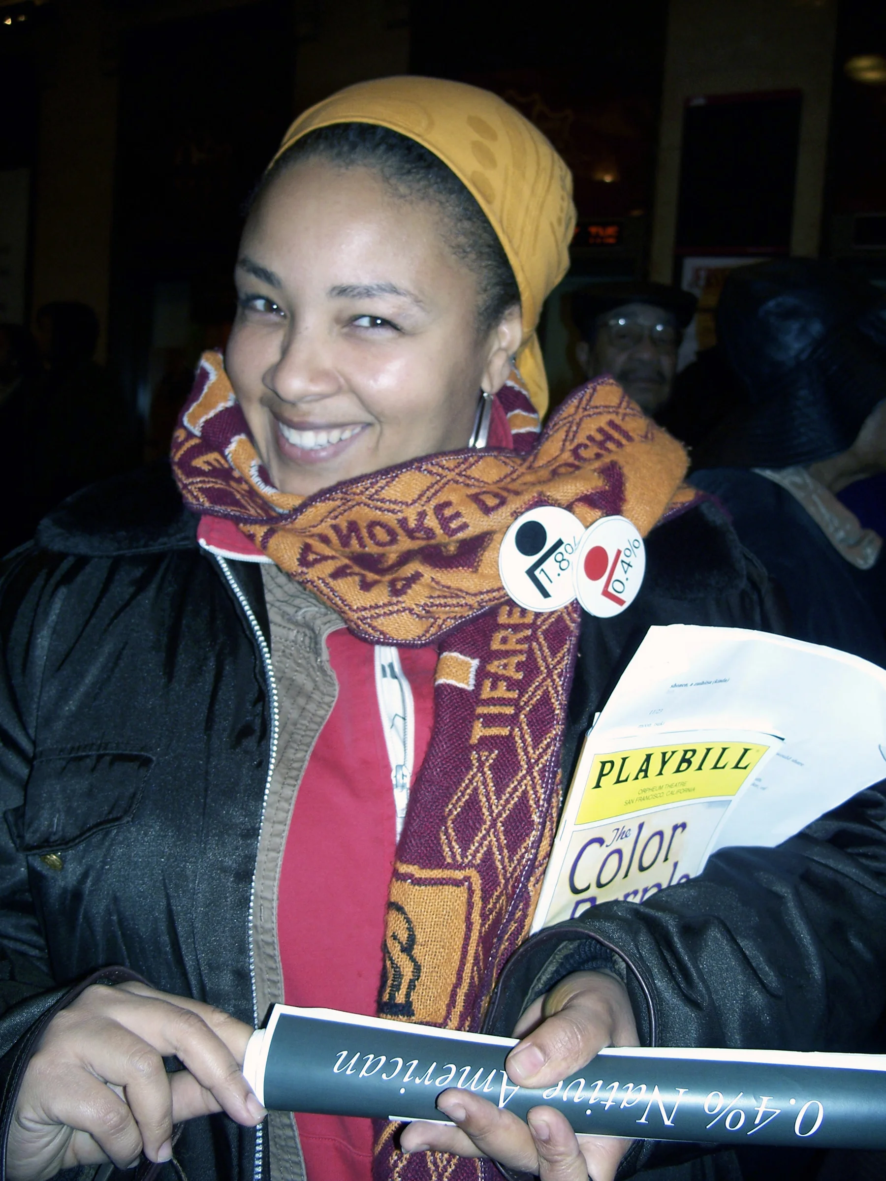 CCA grad student, Latasha Diggs, wearing "1.8%" and "0.4%" buttons
