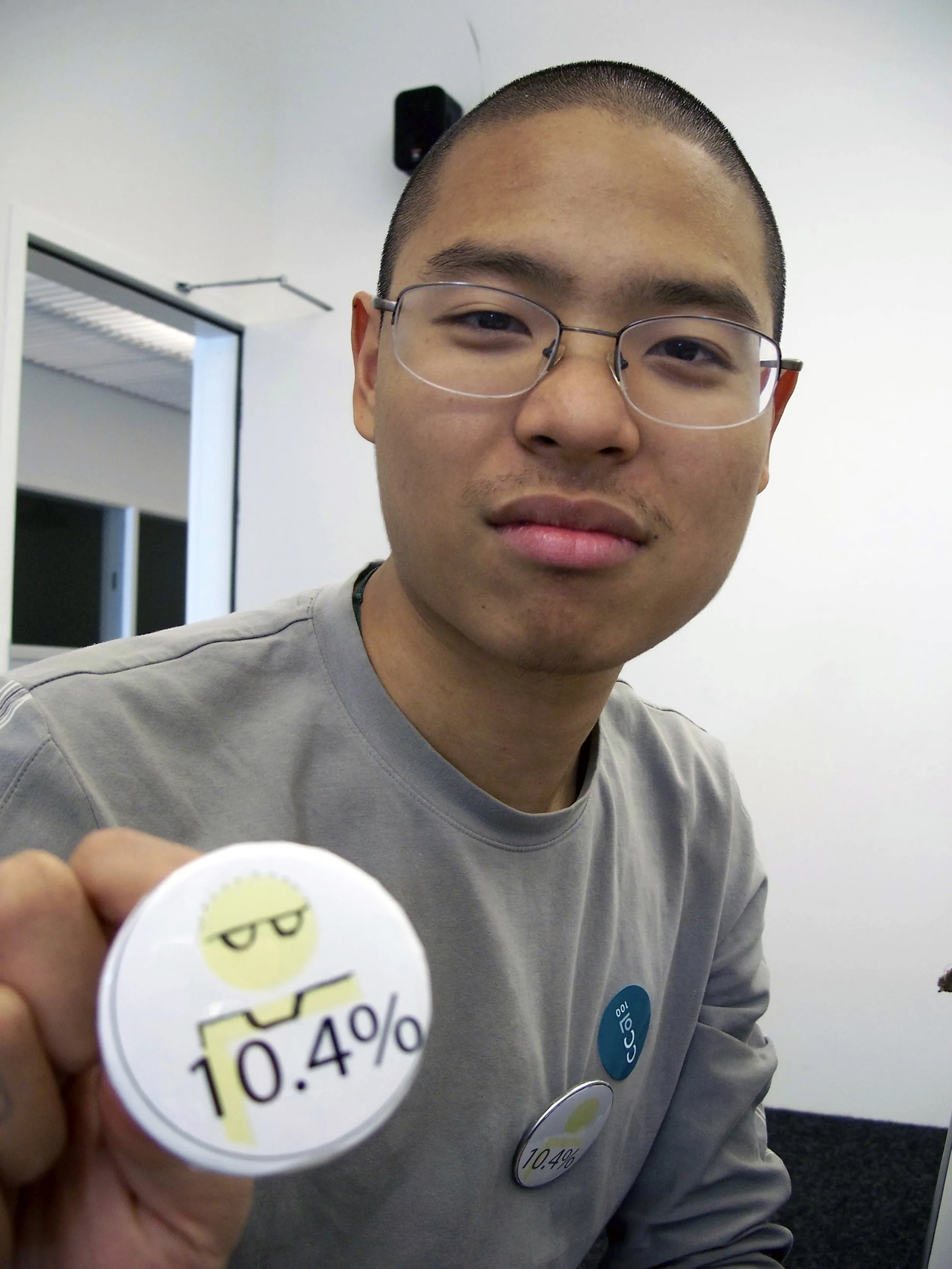 CCA architecture student posing with modified "10.4%" button