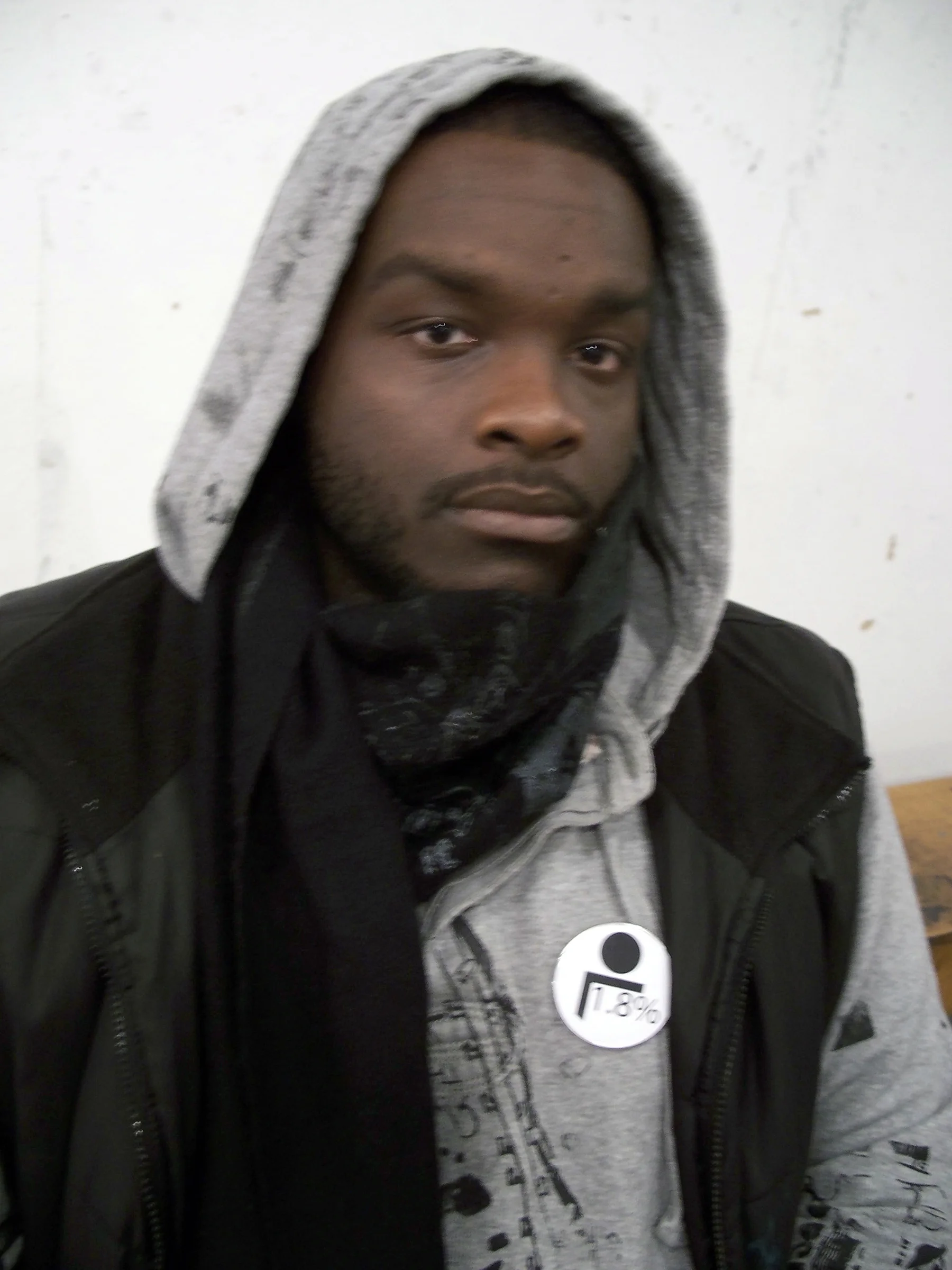 CCA student, Keith Magruder, with "1.8%" button