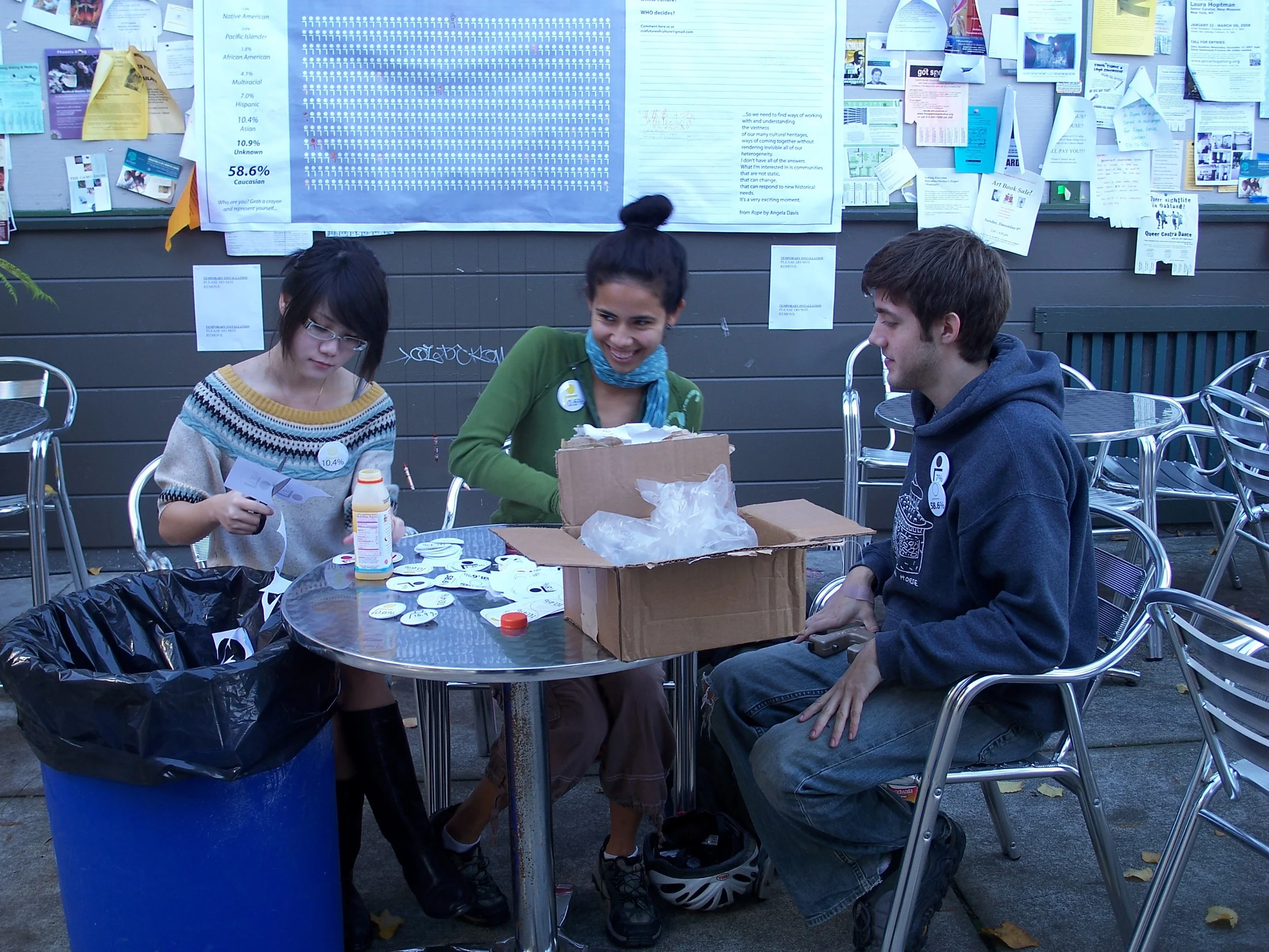 Button making with CCA student reps in front of Office of Student Affairs 