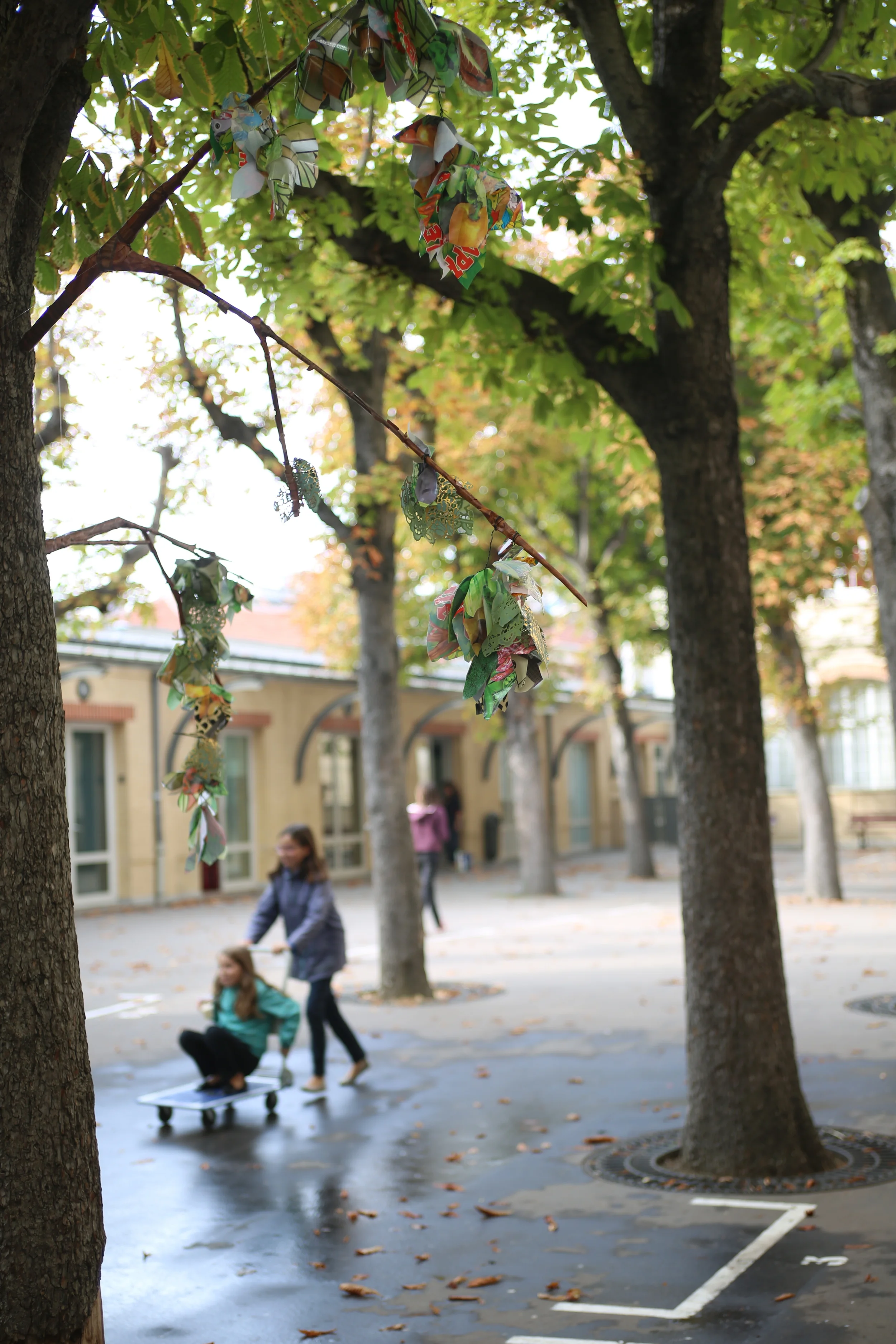  2015 Installation for  La Fête à&nbsp;Colette ,&nbsp;Nuit Blanche arts festival, Collège Collete Besson, Paris, France, miscellaneous plastic tablecloths, drawer liner,&nbsp;faux wood bought in local family discount stores in Ménilmontant district (