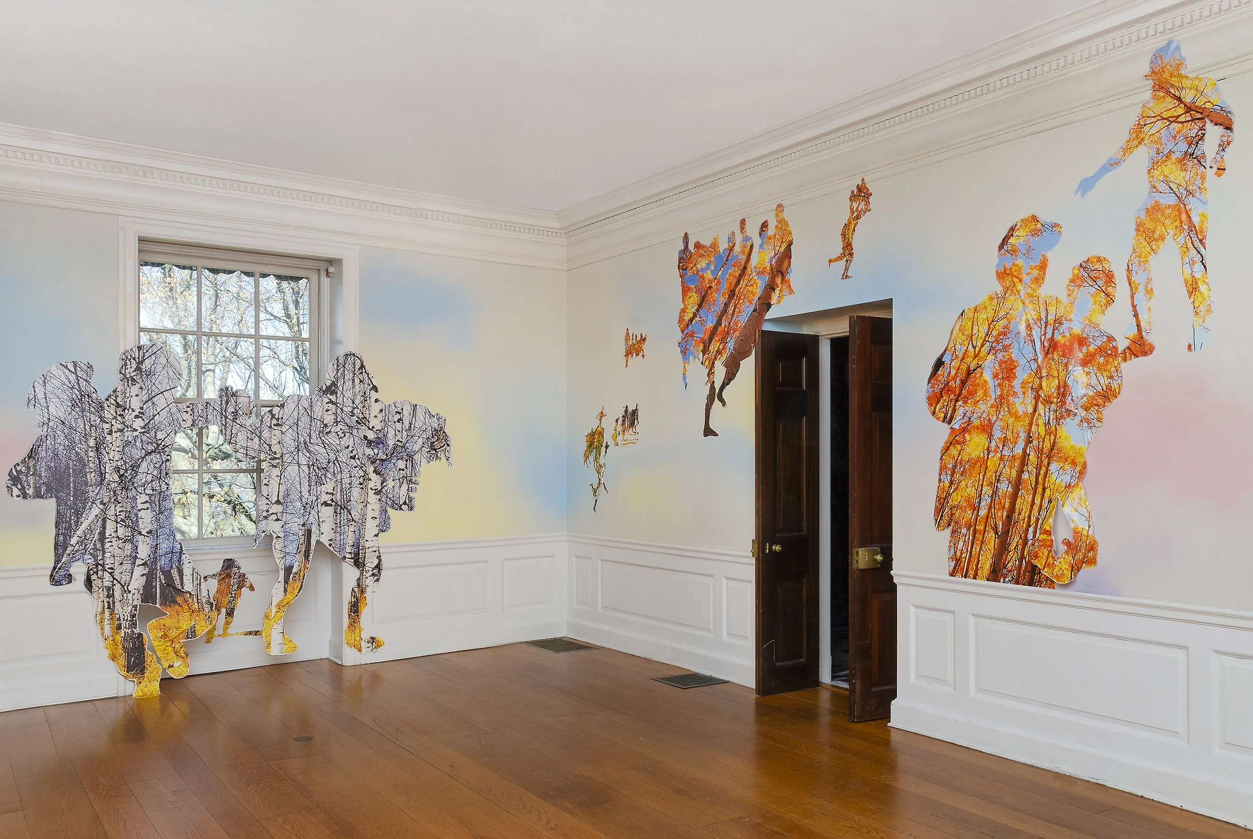 Las Américas (en el hogar) / Americas (in the hearth) , Wave Hill, 2019, Acrylic paint, stock aspen forest vinyl ordered from Amazon, aspen logs, aspen excelsior anti-erosion blanket. Work courtesy of the artist. Image: Stefan Hagen. More info HERE