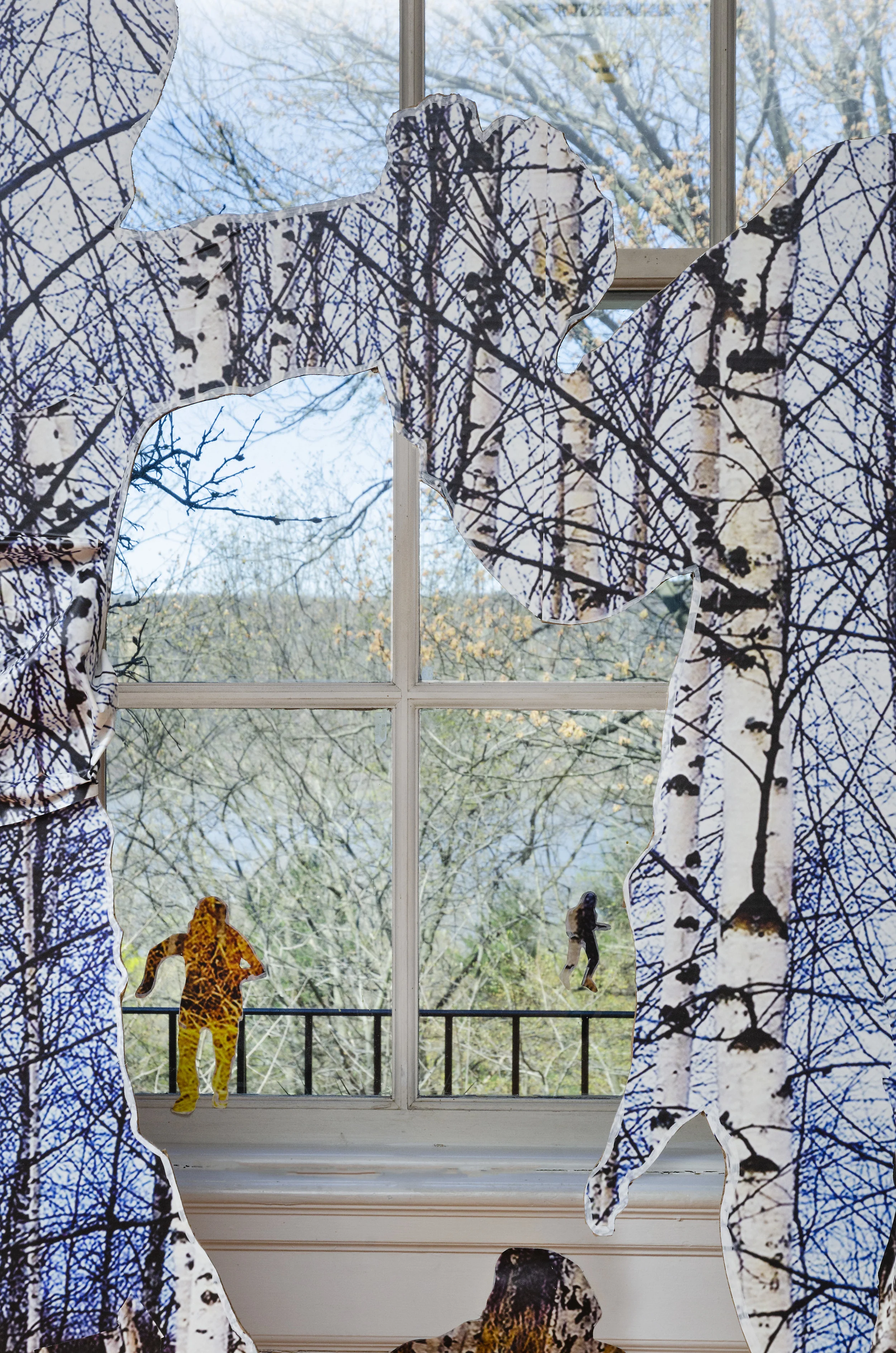 Las Américas (en el hogar) / Americas (in the hearth) , Wave Hill, 2019, Acrylic paint, stock aspen forest vinyl ordered from Amazon, aspen logs, aspen excelsior anti-erosion blanket. Work courtesy of the artist. Image: Stefan Hagen. More info HERE