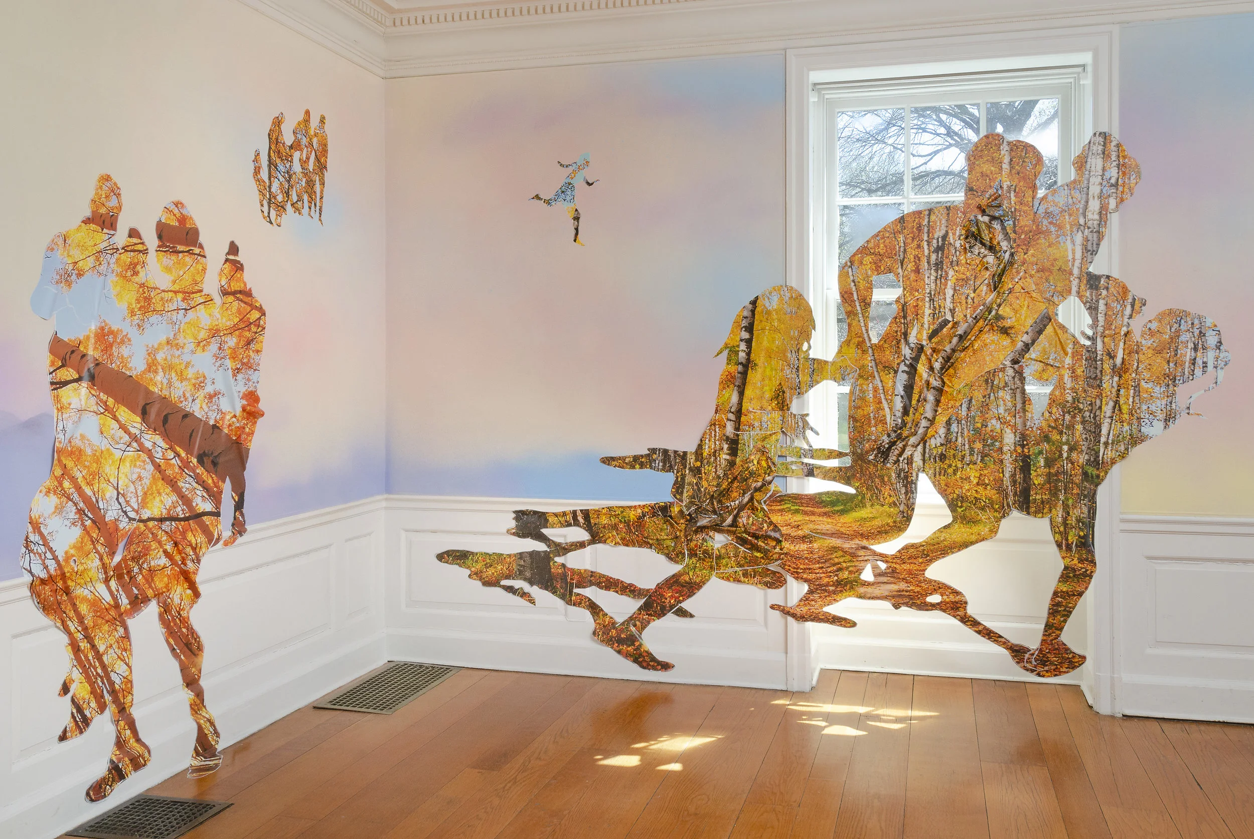 Las Américas (en el hogar) / Americas (in the hearth) , Wave Hill, 2019, Acrylic paint, stock aspen forest vinyl ordered from Amazon, aspen logs, aspen excelsior anti-erosion blanket. Work courtesy of the artist. Image: Stefan Hagen. More info HERE