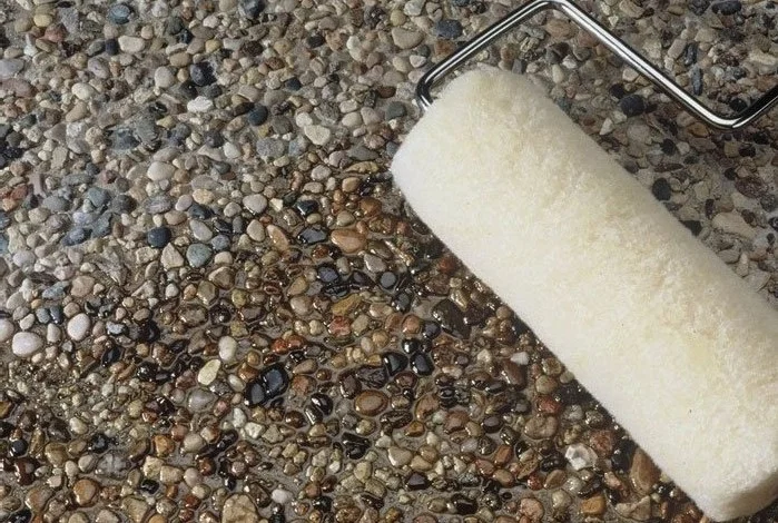 Sealed exposed Aggregate and roller.jpg