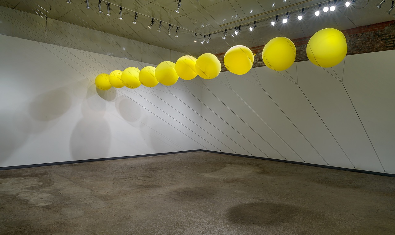   Slow Release   2014  balloons, parachute cord, hardware  dimensions variable   