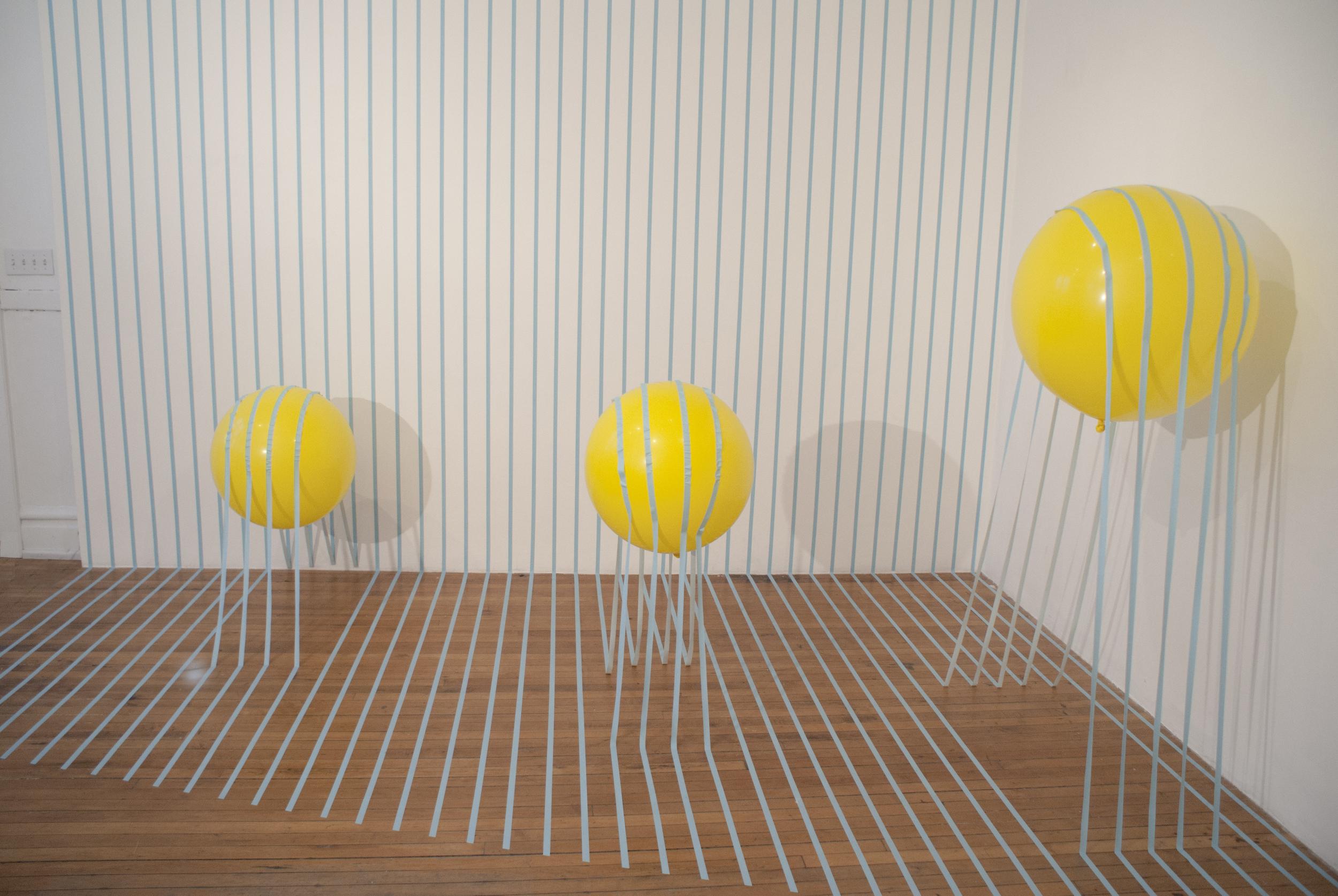   Buoyant Loss   2014  artist tape, balloon, and helium  120”x180”x120” 