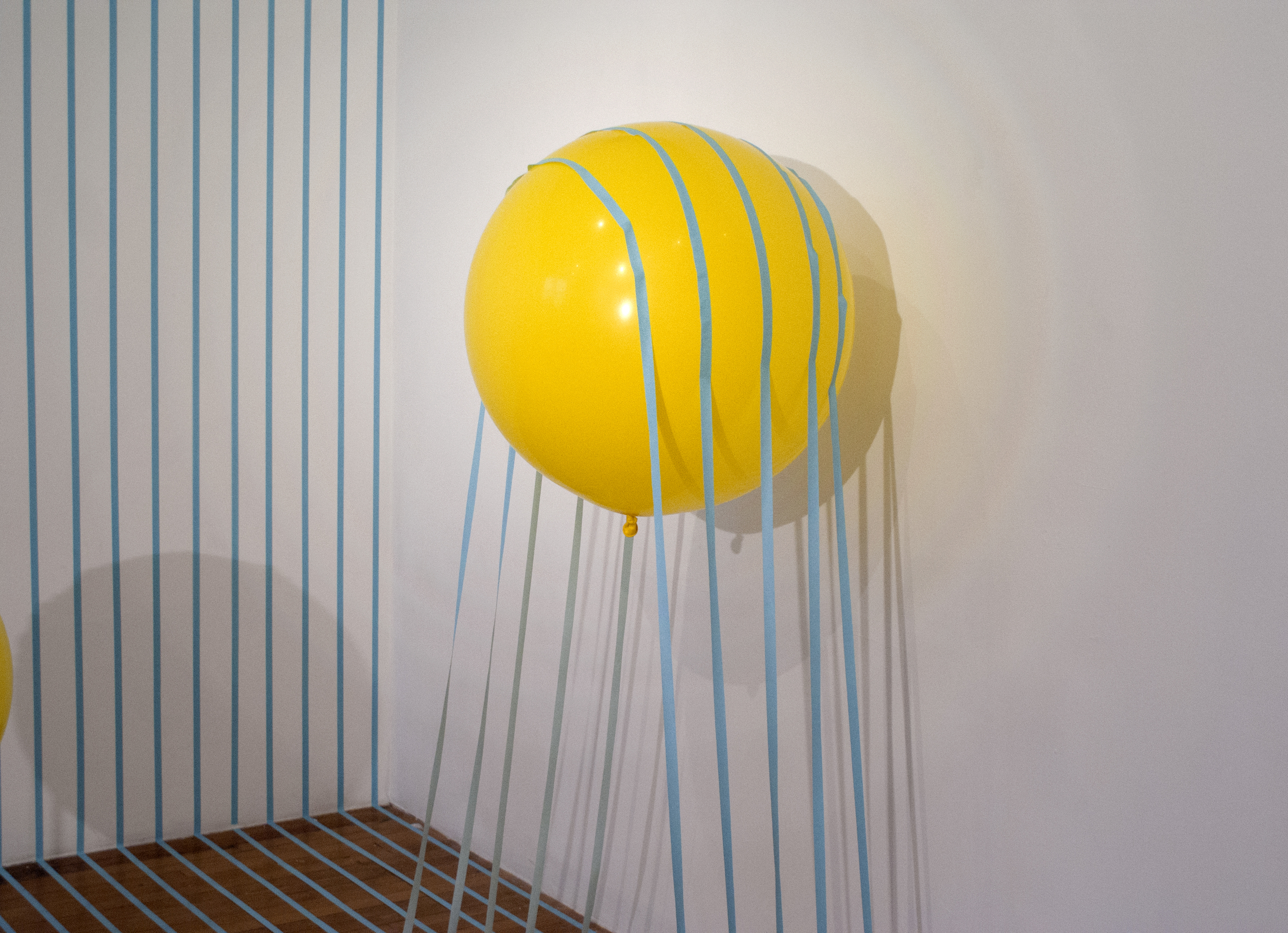 Buoyant Loss 2014 artist tape, balloon, and helium 120”x180”x120”