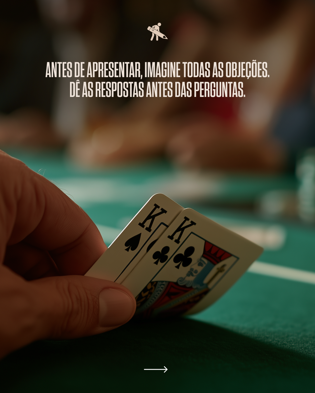 A person holding a hand of playing cards, specifically a King of spades, King of clubs, King of hearts, and King of diamonds, on a green poker table.