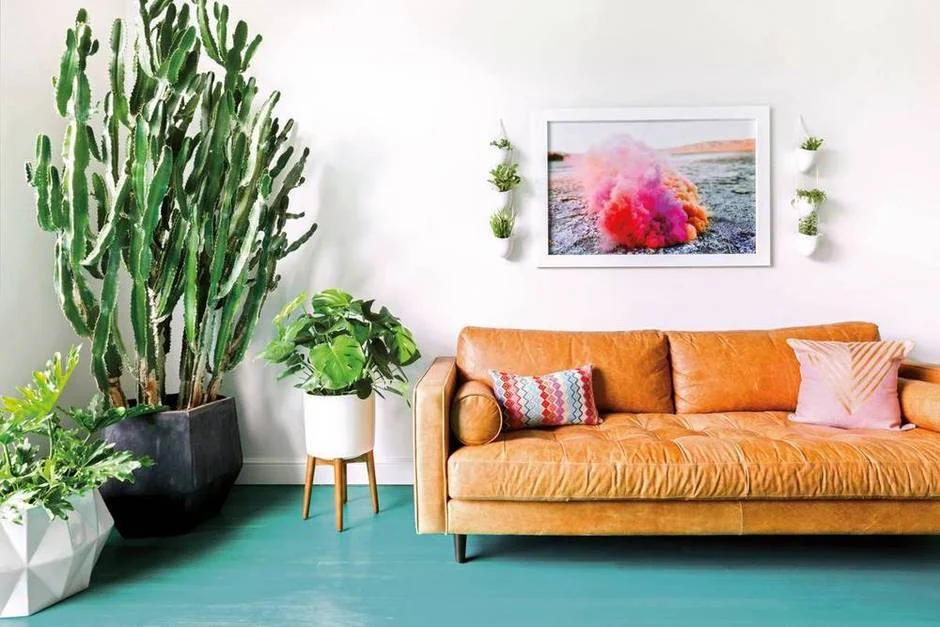 at-first-blush-a-beautiful-mess-elsie-larson-at-home-in-nashville-blue-and-brown-and-white-living-room-1475081109-57ebeb790da6a8082e0013ad-w1000_h627.jpg
