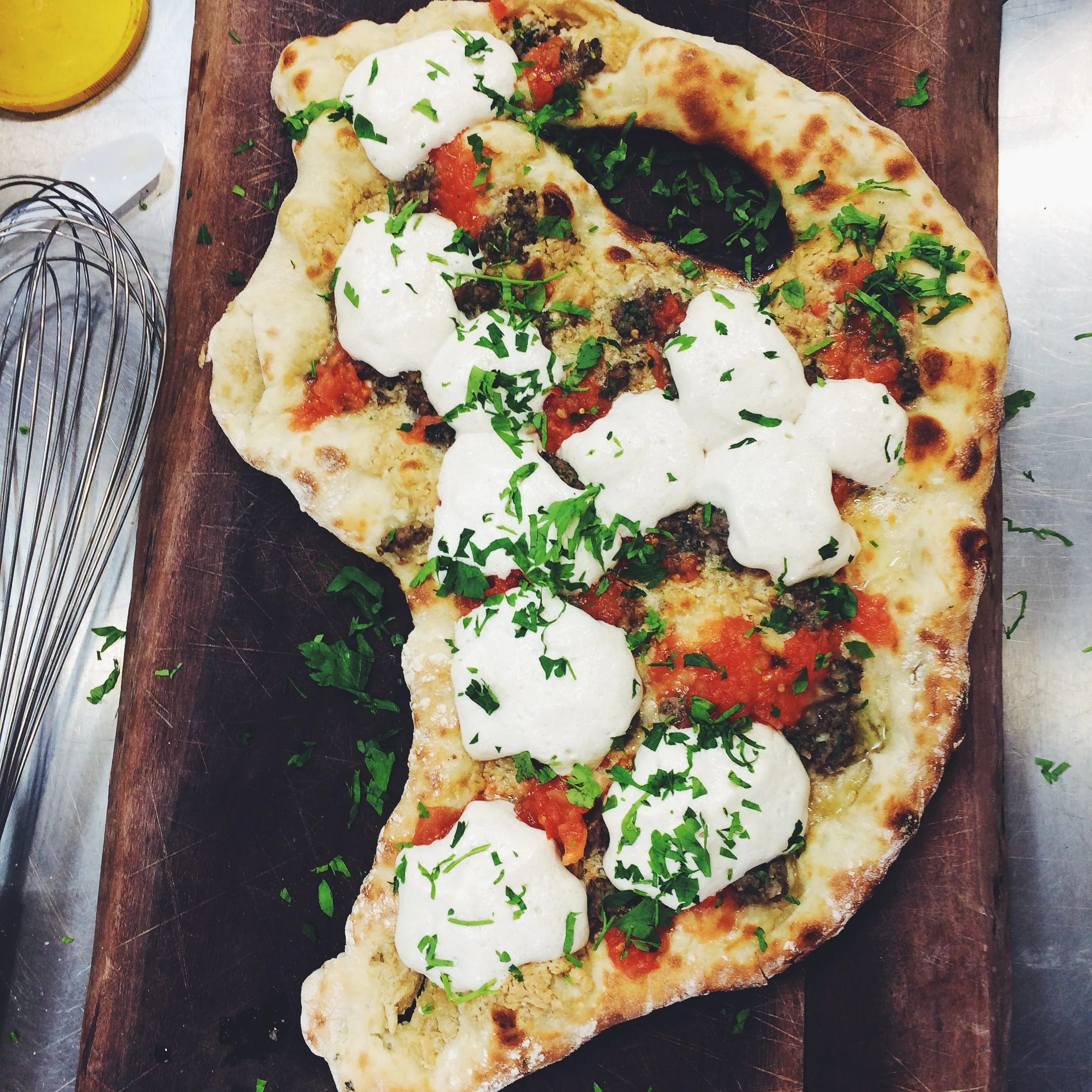 Keeping Kosher I found time again was being leveraged to advantage by Israeli chefs. Although Tel-Aviv is secular in its approach to Jewish cuisine, the culinary school in the city stays strict to the religious rules. That means no cheese with meat. The alternative, Tahini foam on this Lahambajin