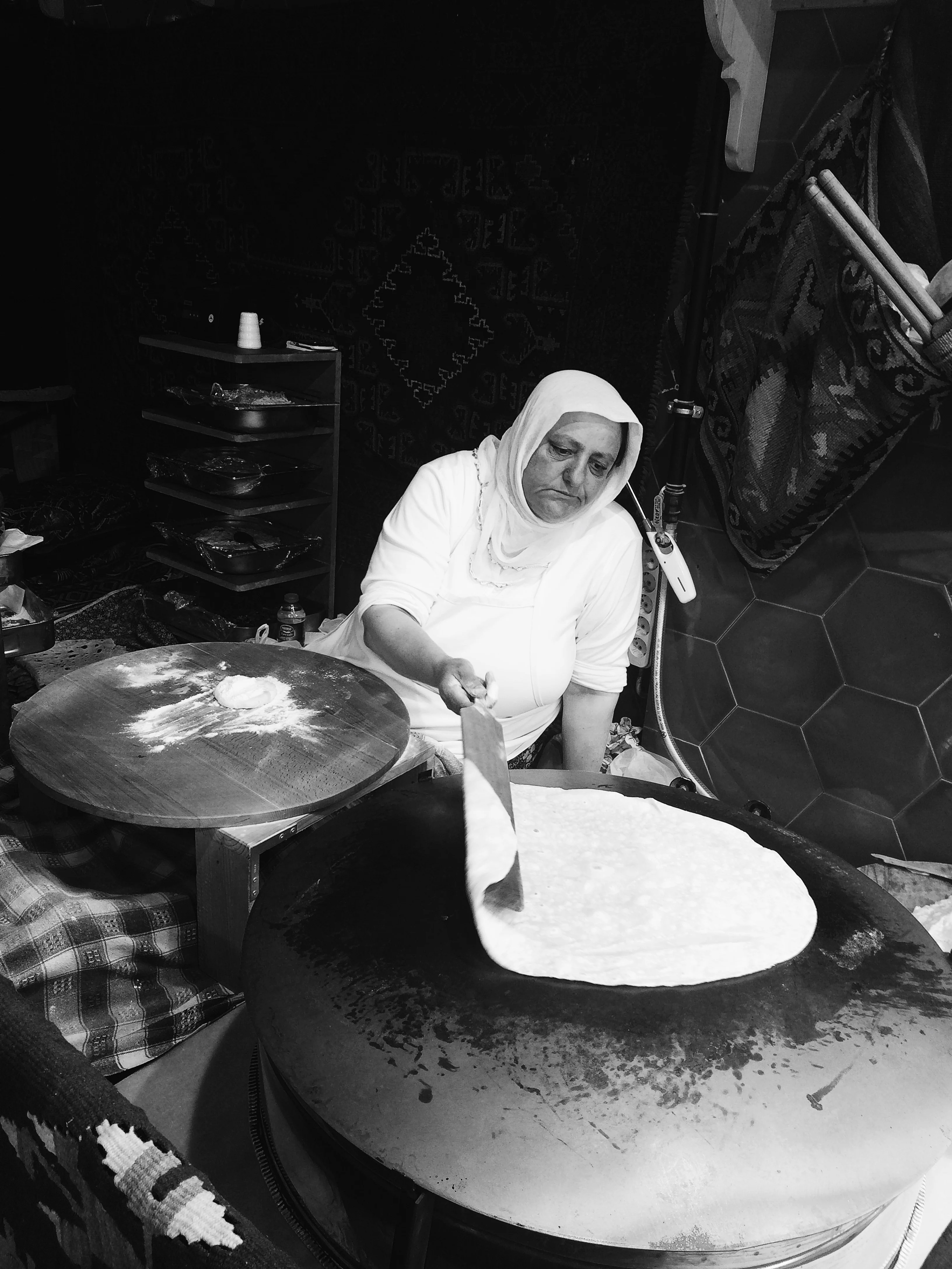 A lady making the thin crepe like bread for Gozleme in a window of a restaurant. I am not kidding. There are many establishments which display ladies making these fresh everyday much like the dumpling making women in Chinatown. Life is hard in the city, and, being an European one, expensive. It often shows in the expressions of people here, who are doing what they can to make ends meet.