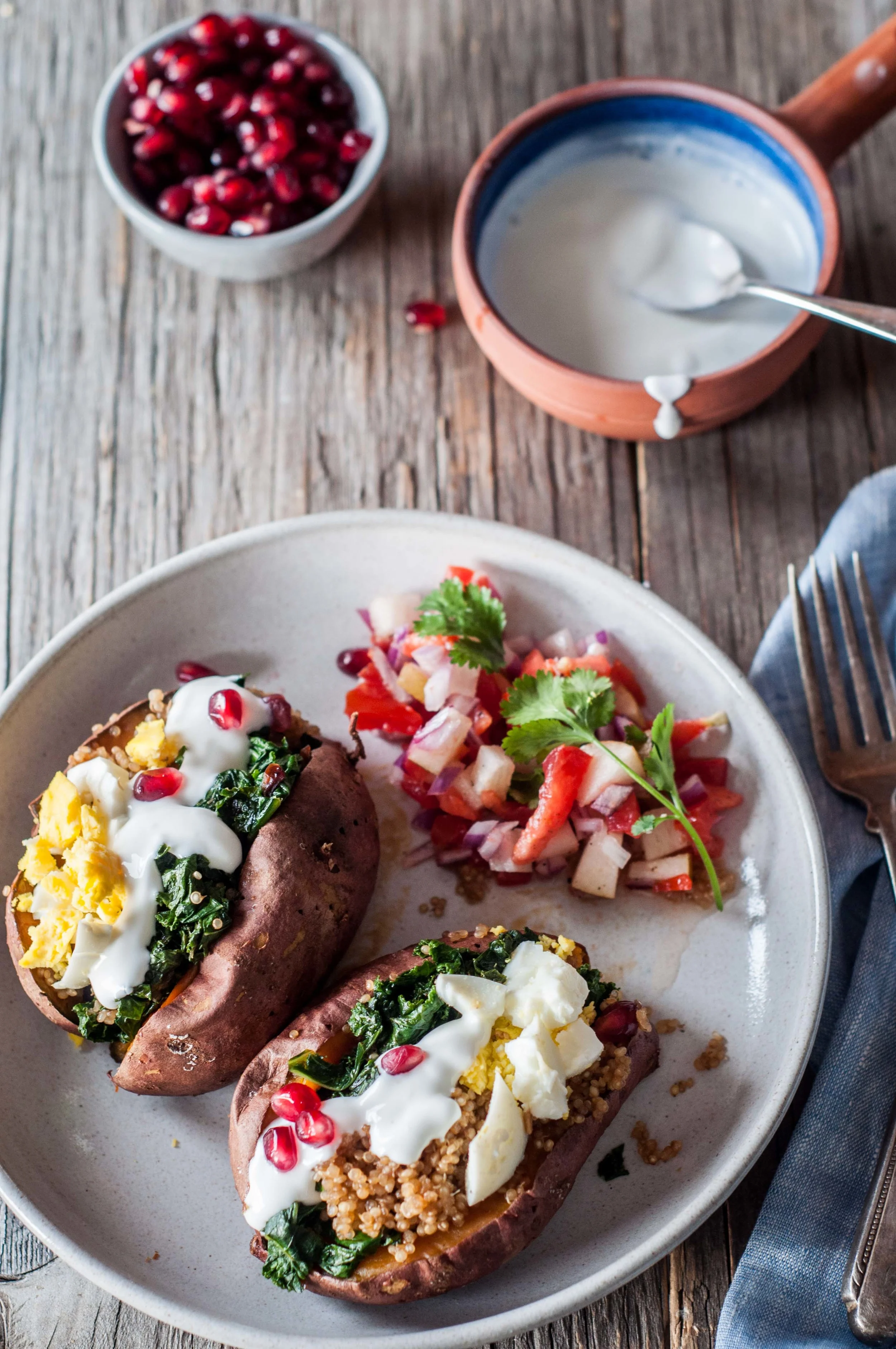 Sweet Potato Jacketed tacos stuffed with quinoa, kale, egg salad with spiced yogurt sauce. Gluten Free and almost Vegan