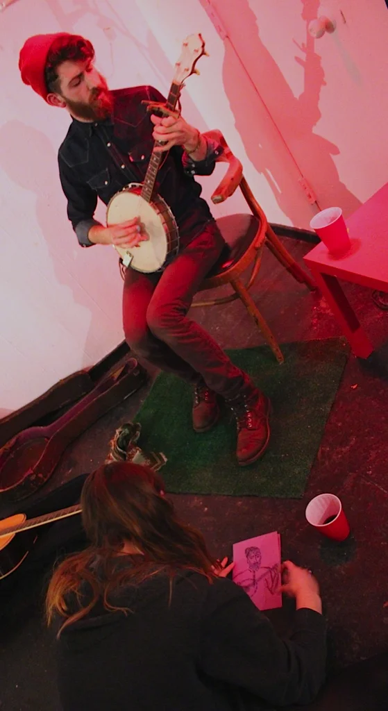 Guido Castellani '14 performs as Hannah Rothpearl '17 sketches him