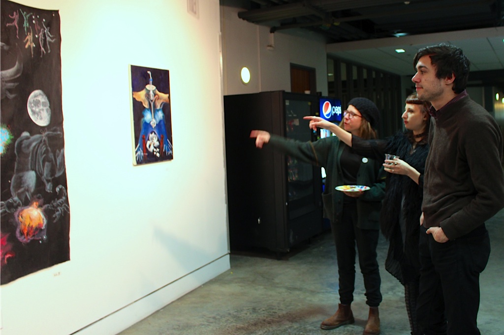  Vered Engelhard '16, Hannah Rifkin '16, and Connor Simcox '16 examine one of Hannah's paintings 