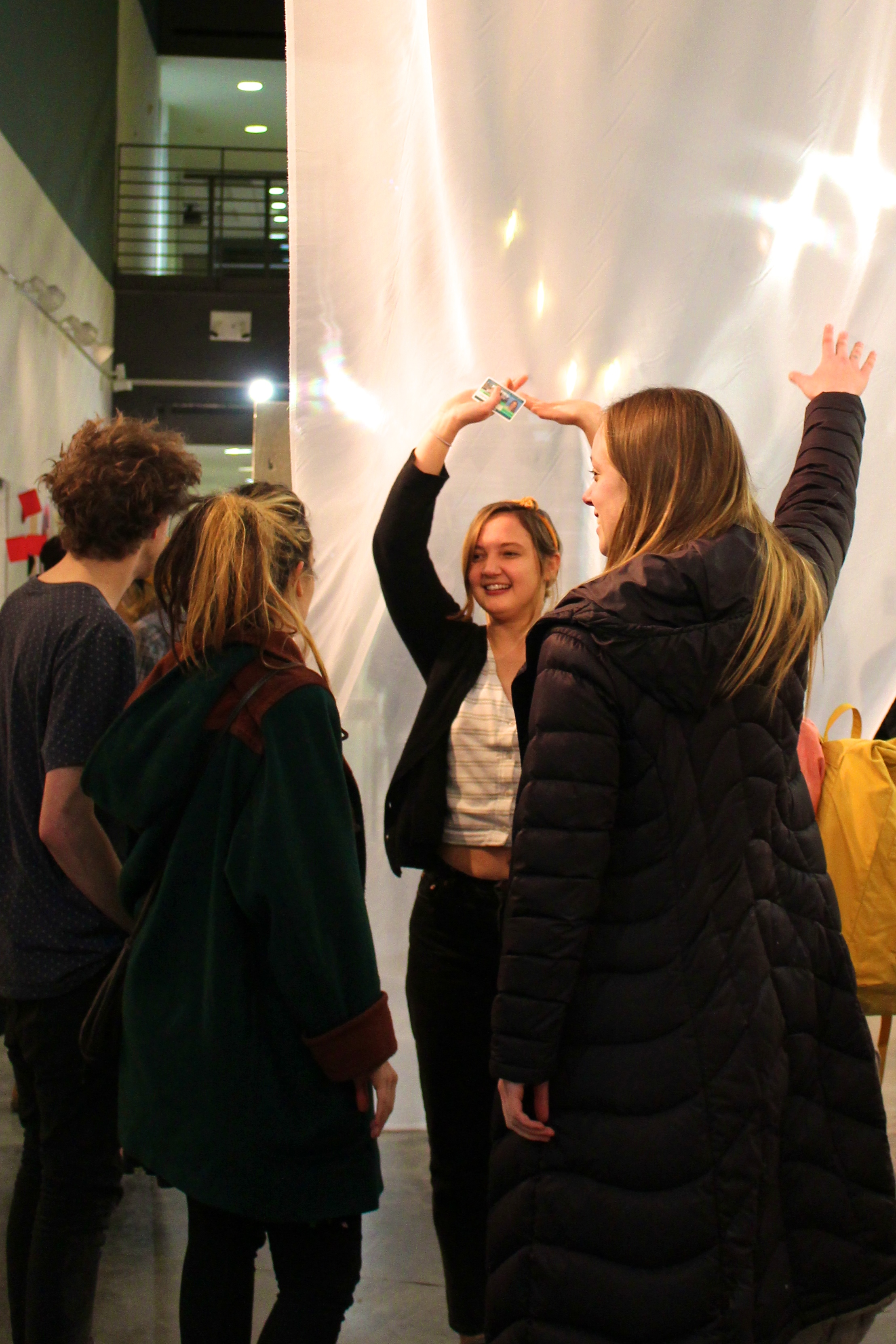Jonathan Worcester '15, Maddy Rojas '14, Emma Sadowski '15, and Emily Loughlin '15 interact with Sadie Bills' installation