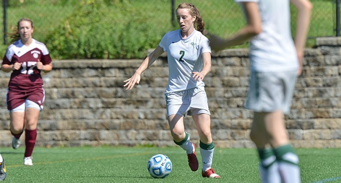 Sadie Zavgren '17 looks for an open teammate to pass to Photo by Paul Blascovich