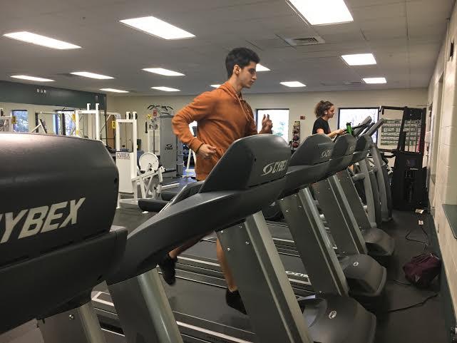 Jasper Soloff running on a treadmill in Campbell Sports Center. Photo credit: Andrea Cantor '17