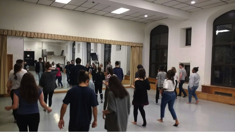 A photo of the Salsa club members following dance teacher Josie LaRiccia’s instruction. Photo Credits: ian gonzalez