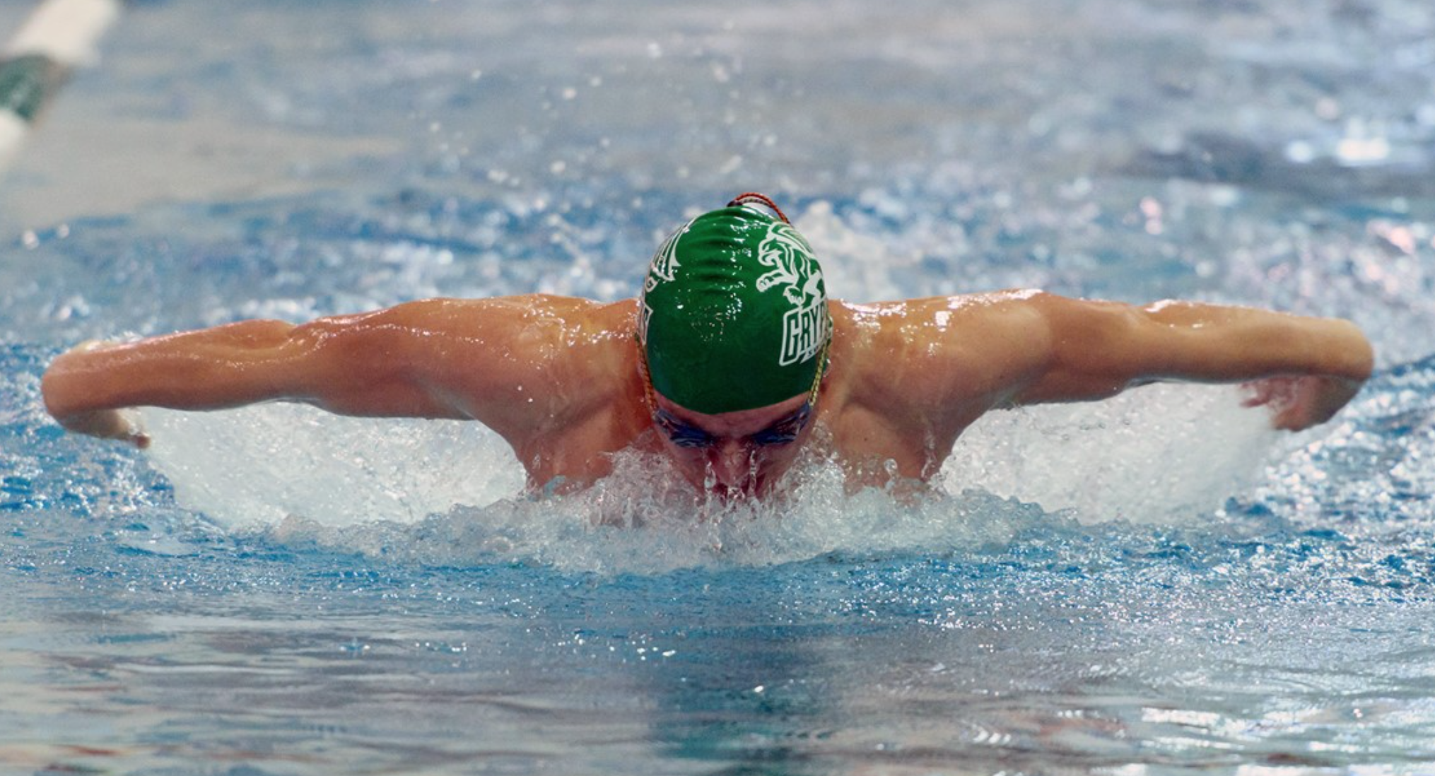 LAWSON TAKES A BREATH WHILE SWIMMING THE 200 MEDLEY AT A MEET PHOTO BY TONY CORREA