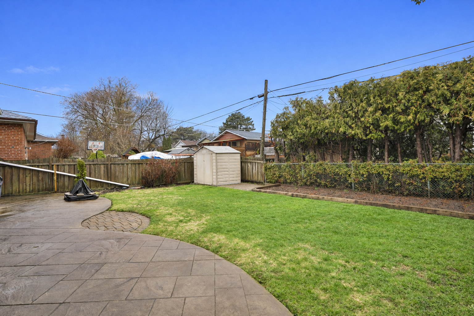 Backyard retreat with fire pit and shed.png