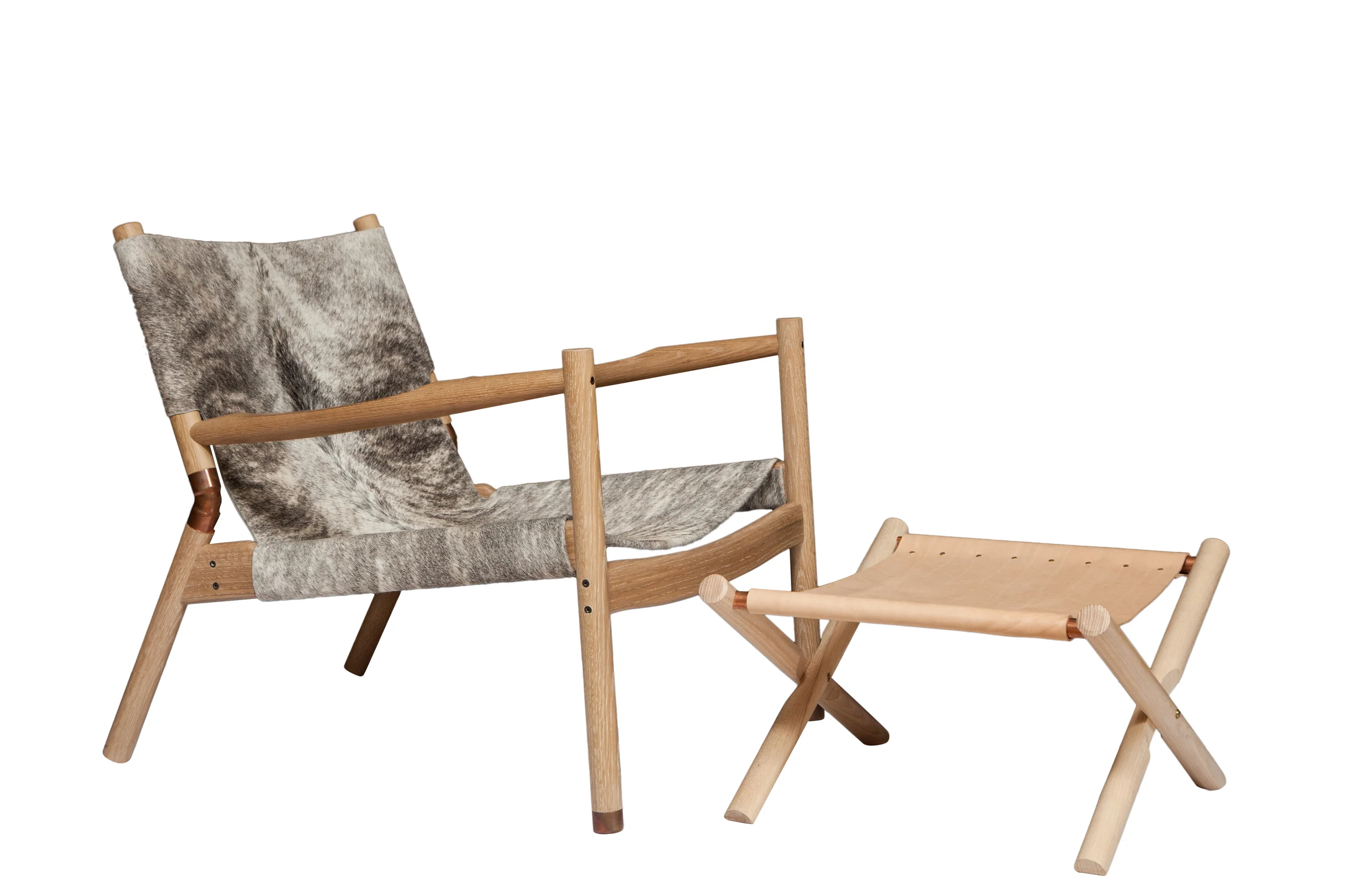 Nude leather Cerused ash Brass hardware 12”H x 22” W x 19” D Shown with grey brindle EÆ Lounge chair