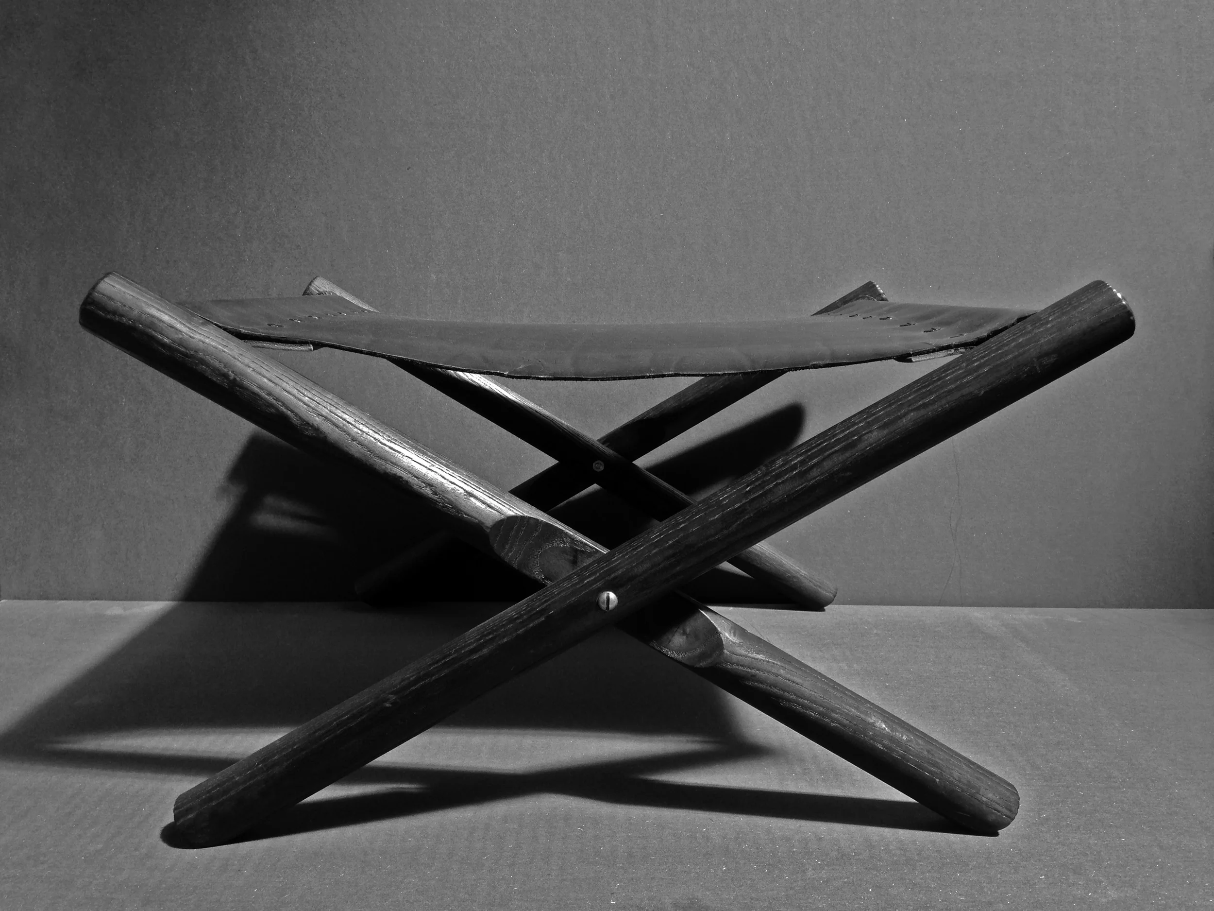 Wrinkled black leather Charred oak 12”H x 22” W x 19” D