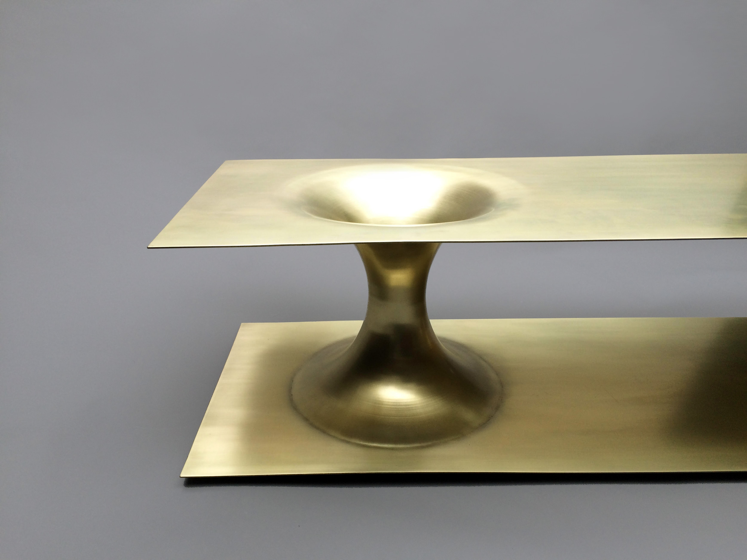   Brass plated steel   Brushed finish 60” L x 20” D x 15.5” H  