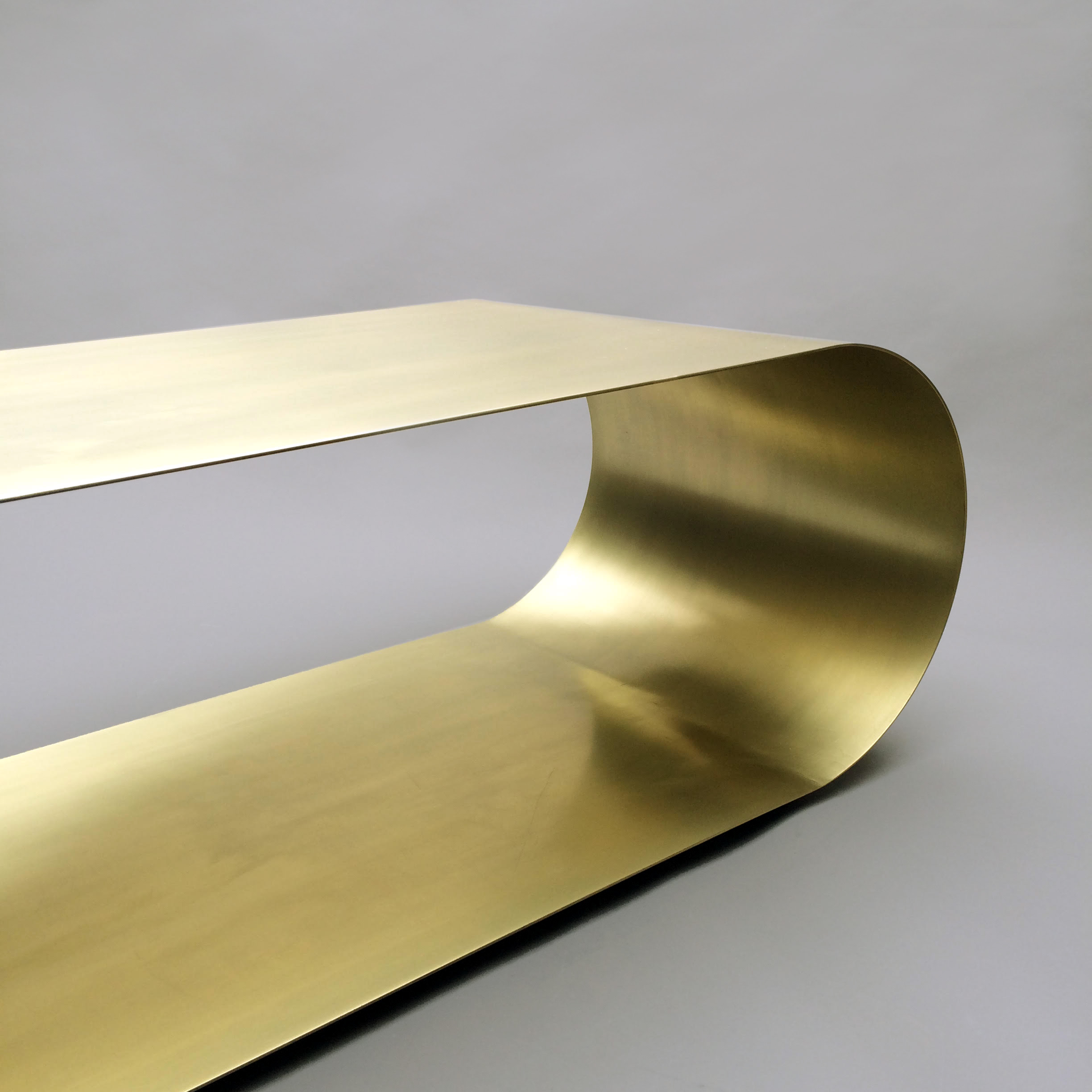   Brass plated steel   Brushed finish 60” L x 20” D x 15.5” H  