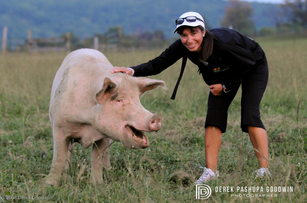 Hilda Club member with pig at Farm Sanctuary Hoe Down